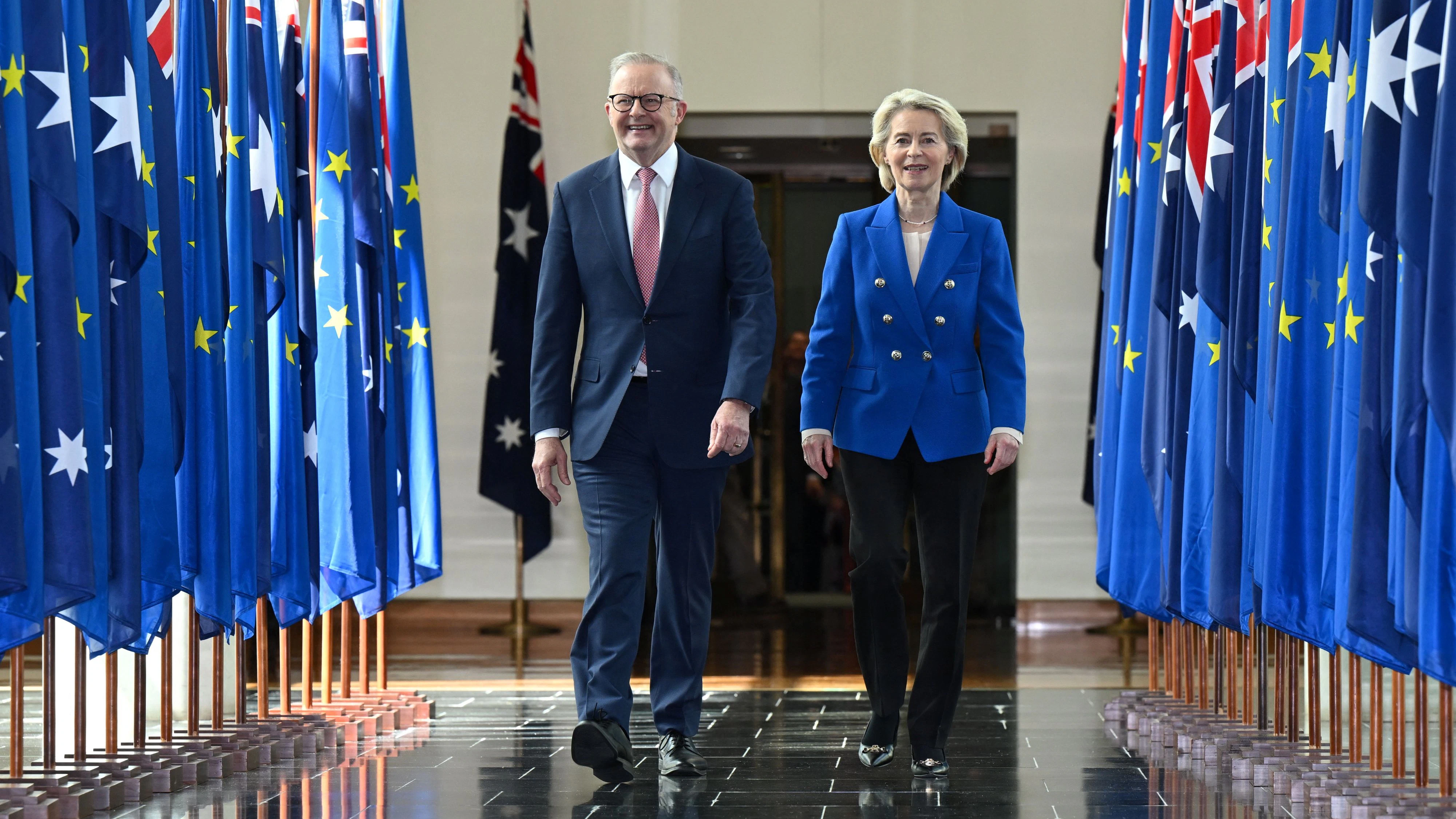 Australian Prime Minister Anthony Albanese and President of the European Commission Ursula von der Leyen walk together after an address to Members and Senators during a joint sitting in the House of Representatives at Parliament House in Canberra, Australia, March 24, 2026. Lukas Coch/AAP/via REUTERS    ATTENTION EDITORS - THIS IMAGE WAS PROVIDED BY A THIRD PARTY. NO RESALES. NO ARCHIVE. AUSTRALIA OUT. NEW ZEALAND OUT. NO COMMERCIAL OR EDITORIAL SALES IN NEW ZEALAND. NO COMMERCIAL OR EDITORIAL SALES IN AUSTRALIA.