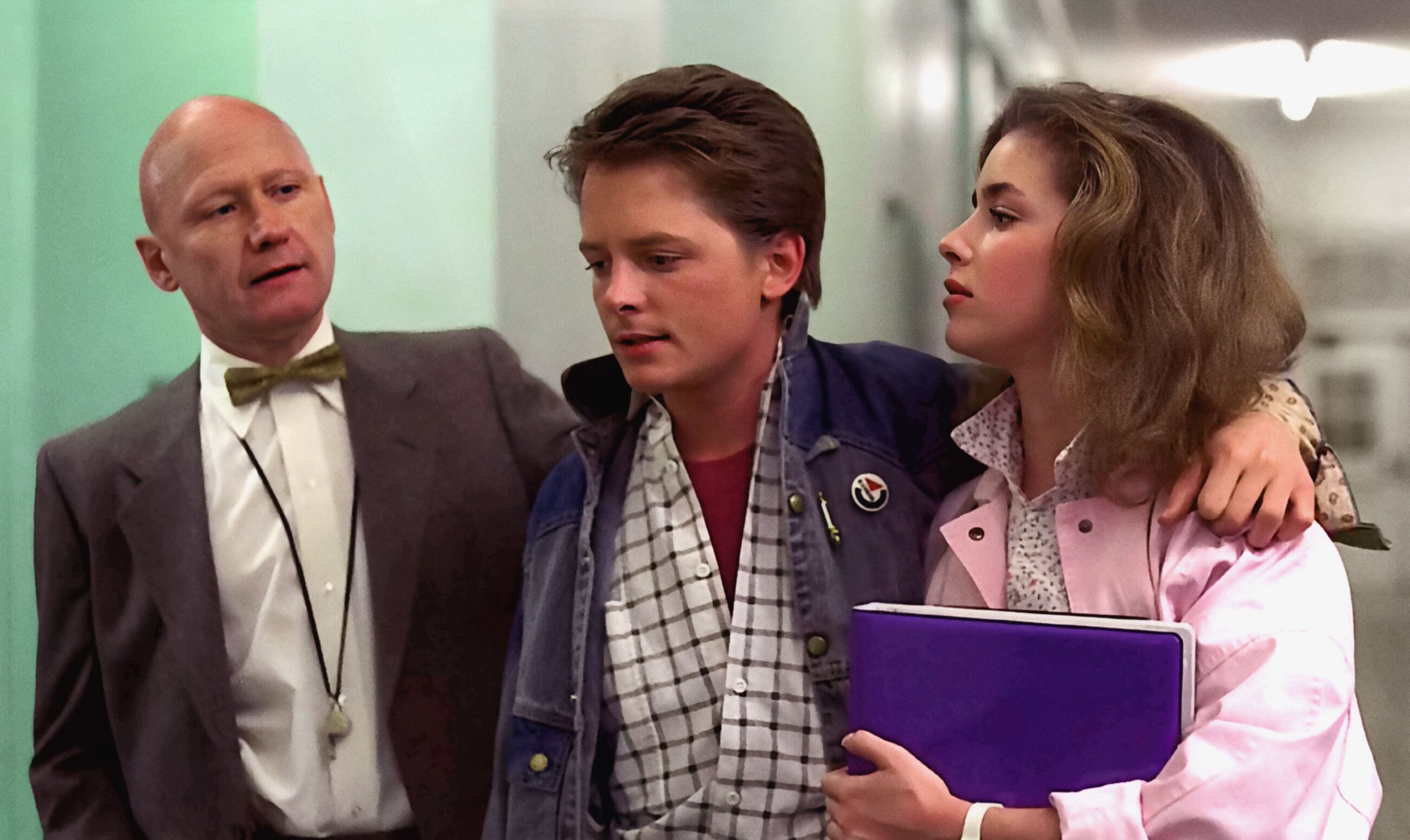 Claudia Wells, James Tolkan (l.) und Michael J. Fox in 