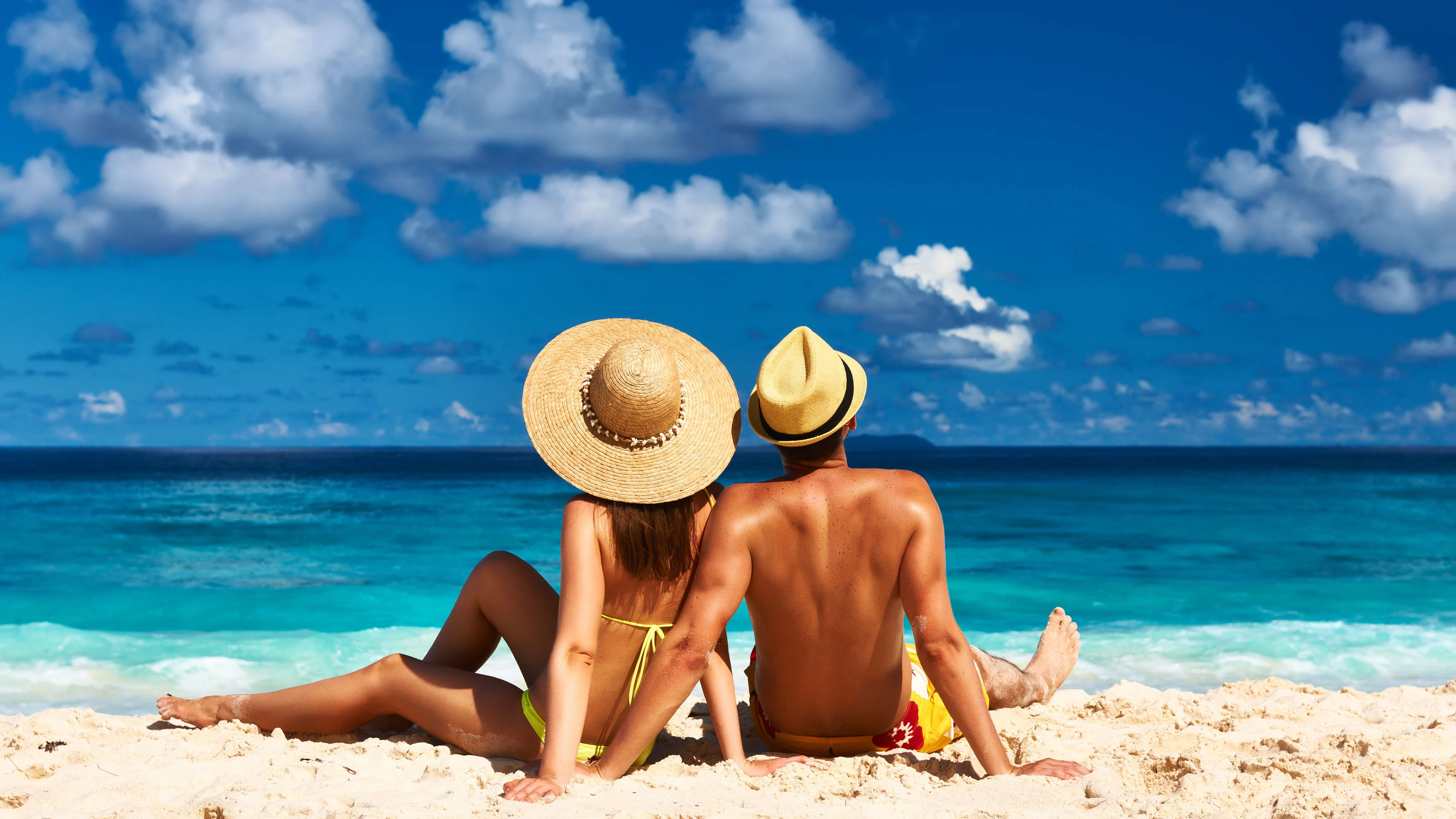 Couple on a tropical beach at Seychelles