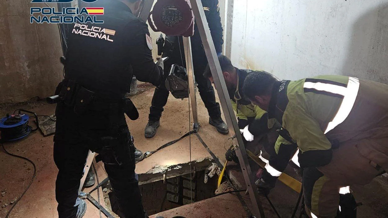 Spanish police officers stand near a tunnel that was used to bring tons of hashish from Morrocco into Spain, in Ceuta, Spain, in an undated picture released on March 31, 2026. Spanish Police/Handout via REUTERS THIS IMAGE HAS BEEN SUPPLIED BY A THIRD PARTY. MUST NOT OBSCURE LOGO.