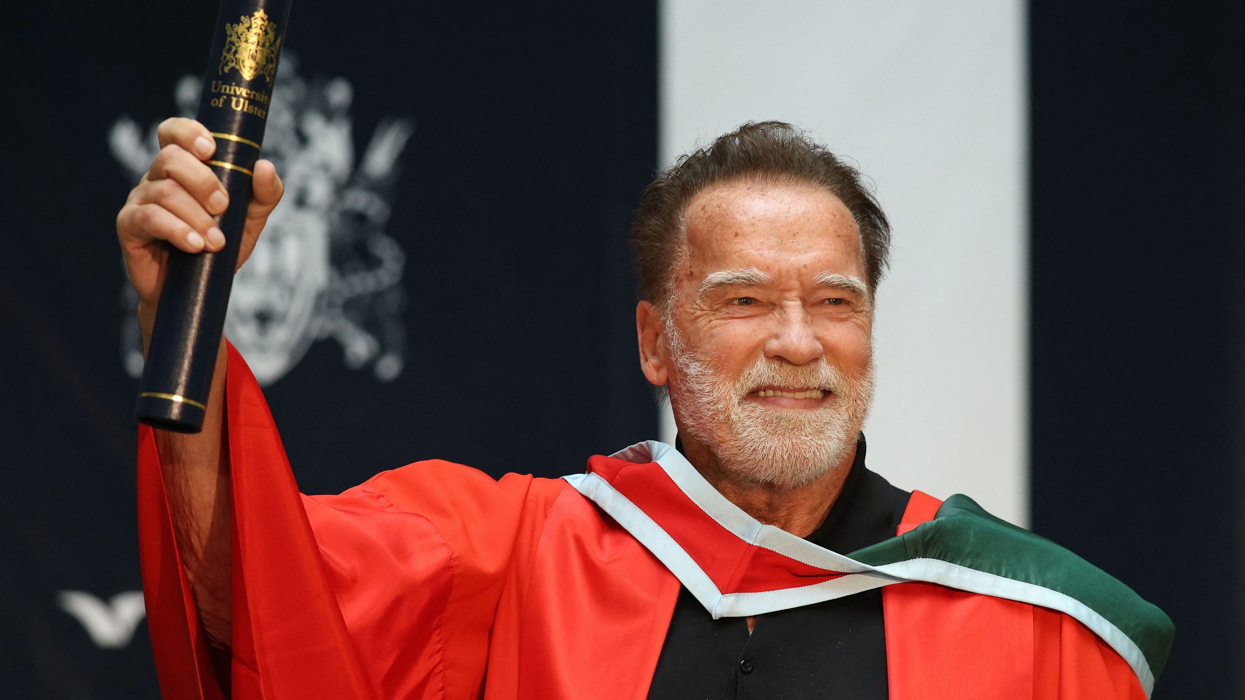 Hollywood actor and former California state governor, Arnold Schwarzenegger, attends a ceremony to receive an honorary doctorate from Ulster University in Belfast, Northern Ireland, on March 30, 2026. (Photo by Paul Faith / AFP)