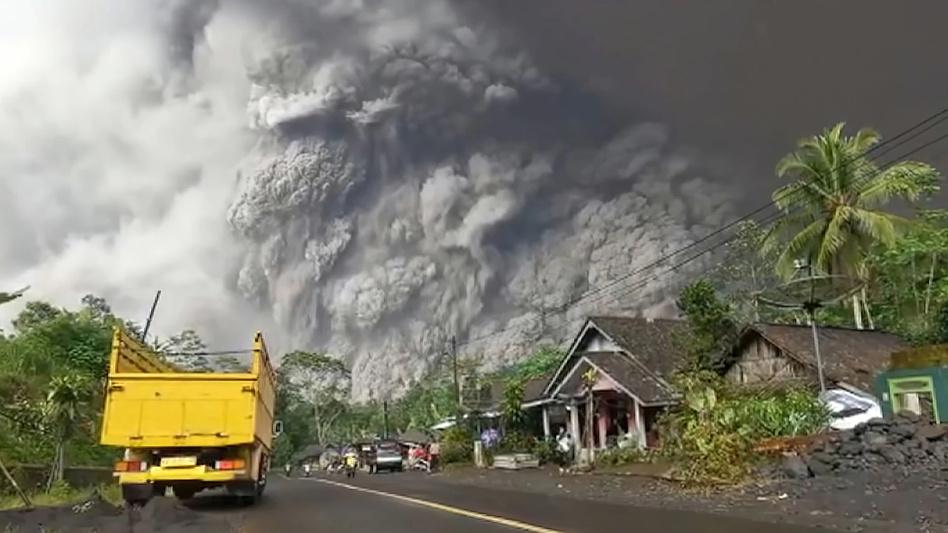 Lumajang, East java, Indonesia- Dec-04-2021,: The eruption of the Semeru Volcano, which occurred on Saturday 4 December 2021 at 15.00 WIB, looks like volcanic ash fills the sky and the air emits heat that is harmful to humans.
