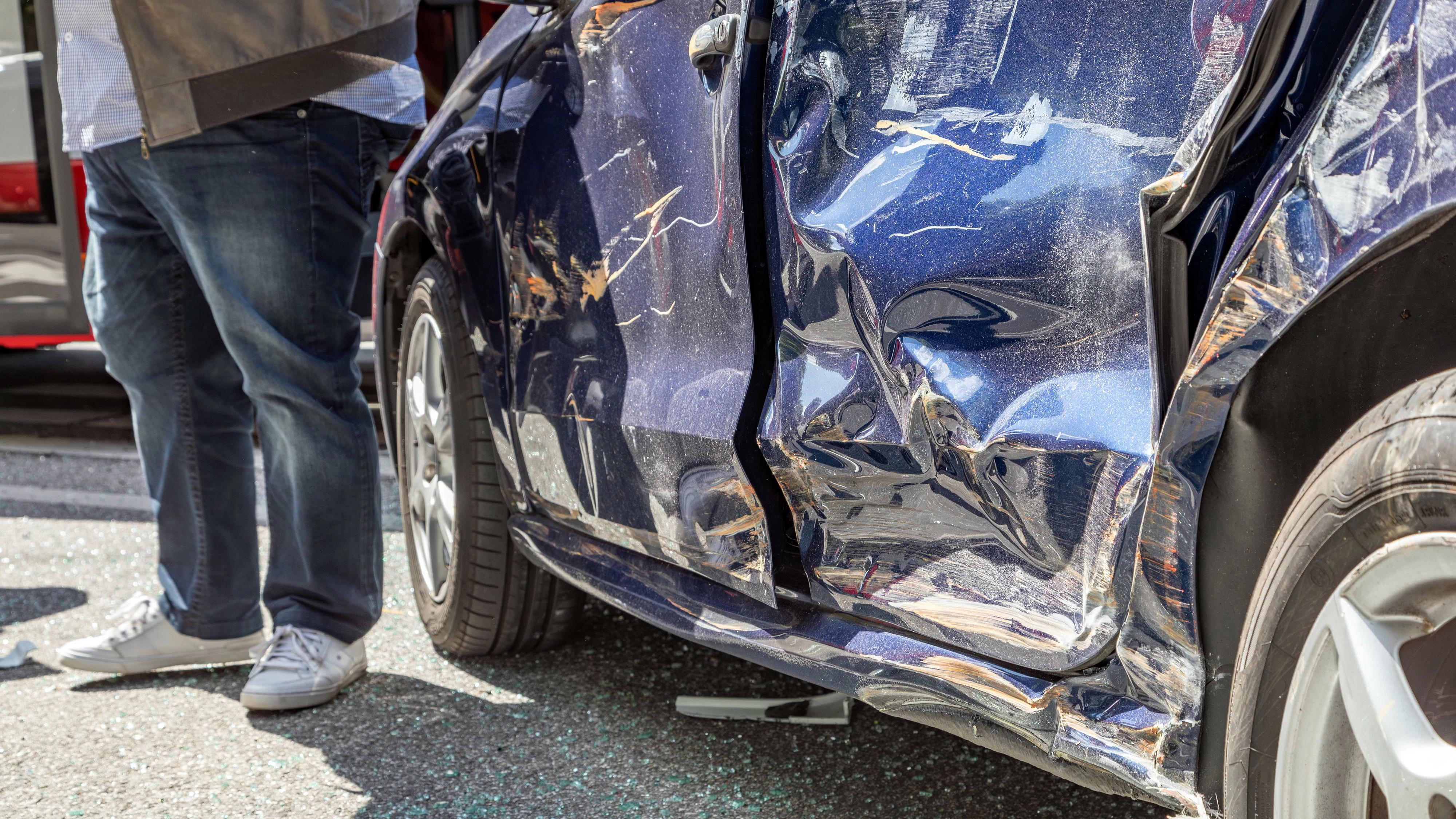 blue car damaged by crash accident