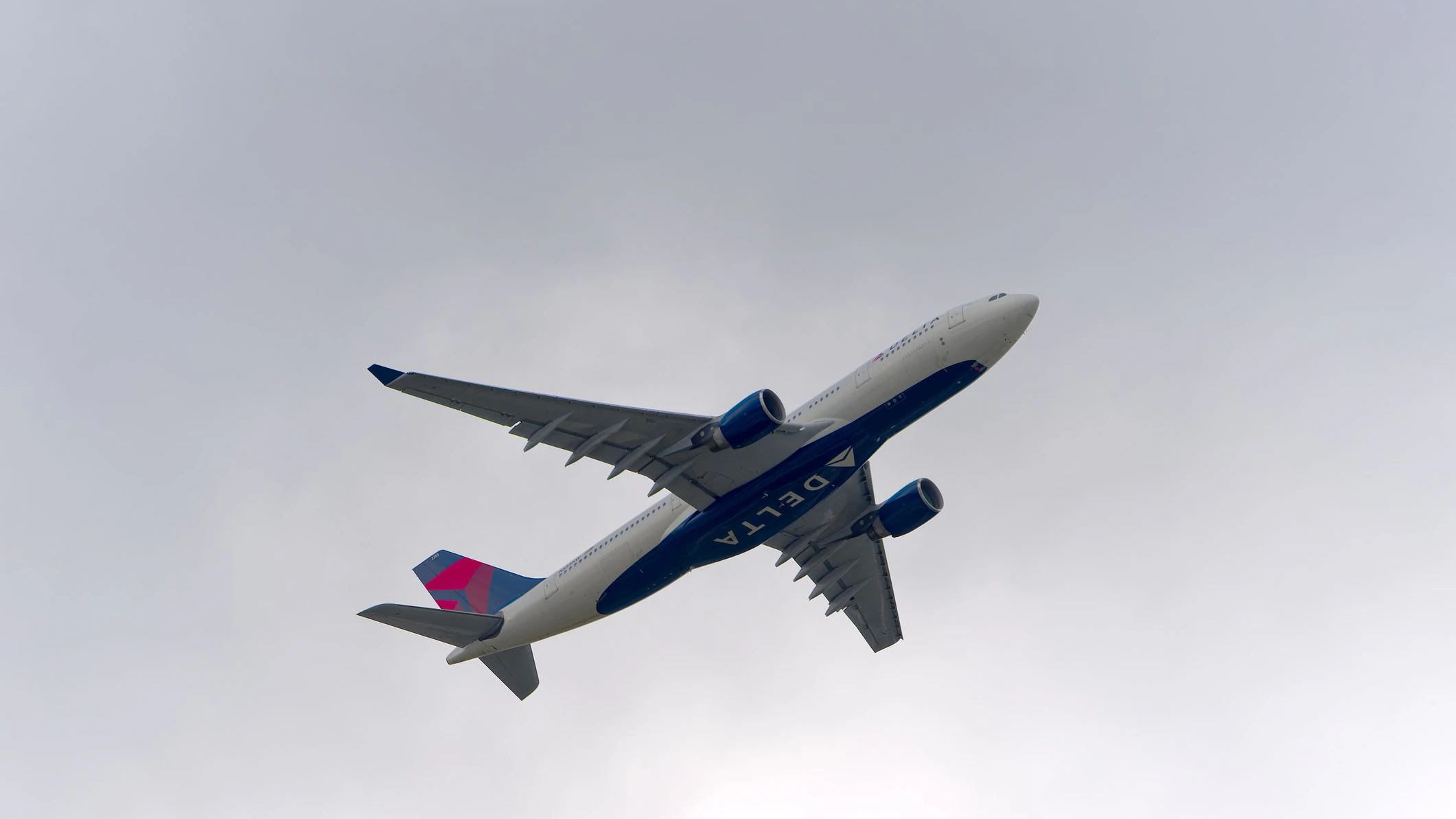 Delta Air Lines passenger airplane type Airbus A330-223 registration N853NW taking off from German Frankfurt Airport on a cloudy autumn day. Photo taken November 3rd, 2025, Frankfurt am Main, Germany.
