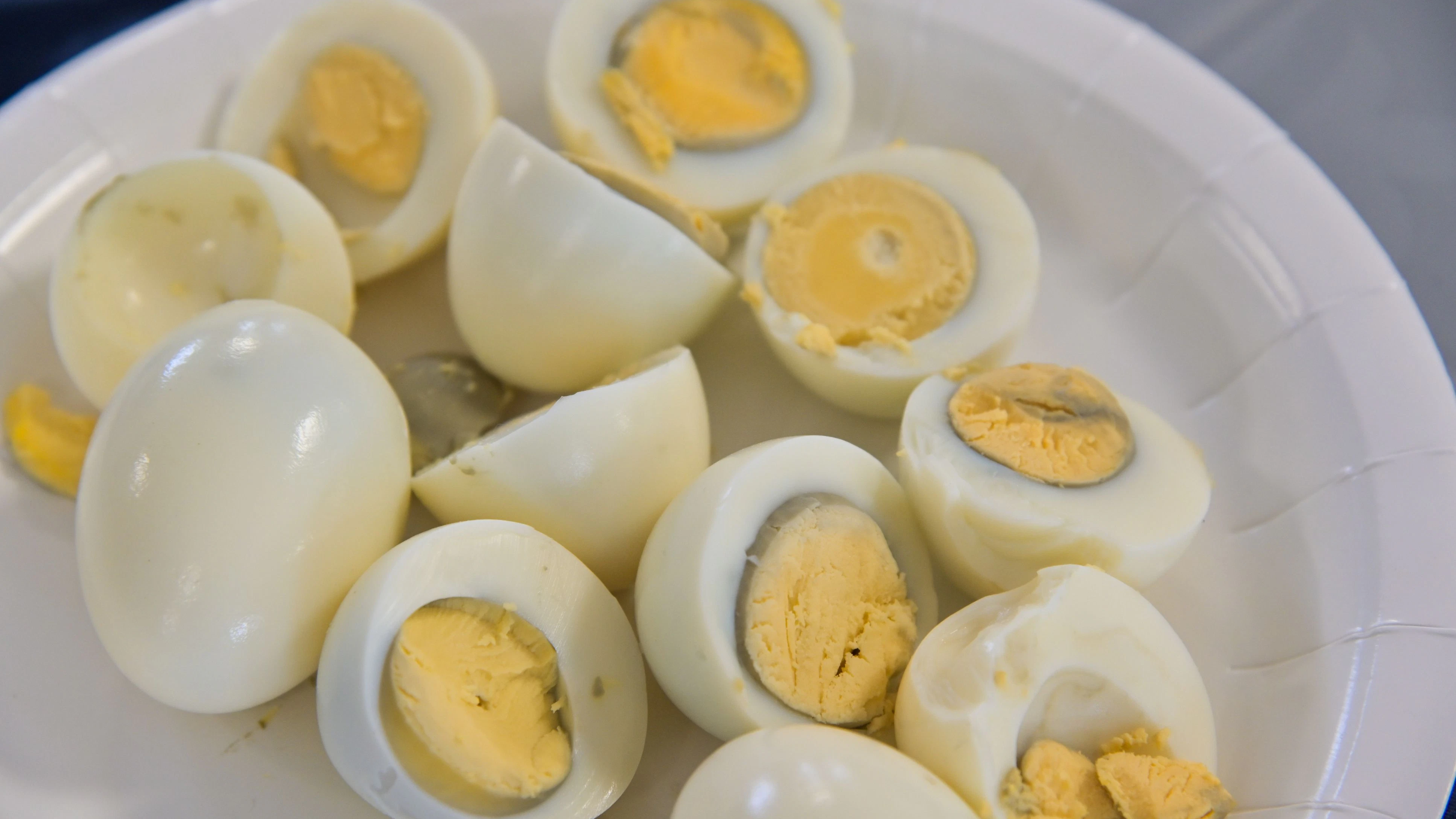 Many halved eggs served in plate on Passover Jewish Holiday.Egg a traditional food of mourning, symbolizes cycle of life expresses mourning for the destruction of the Temple and the lack of sacrifices