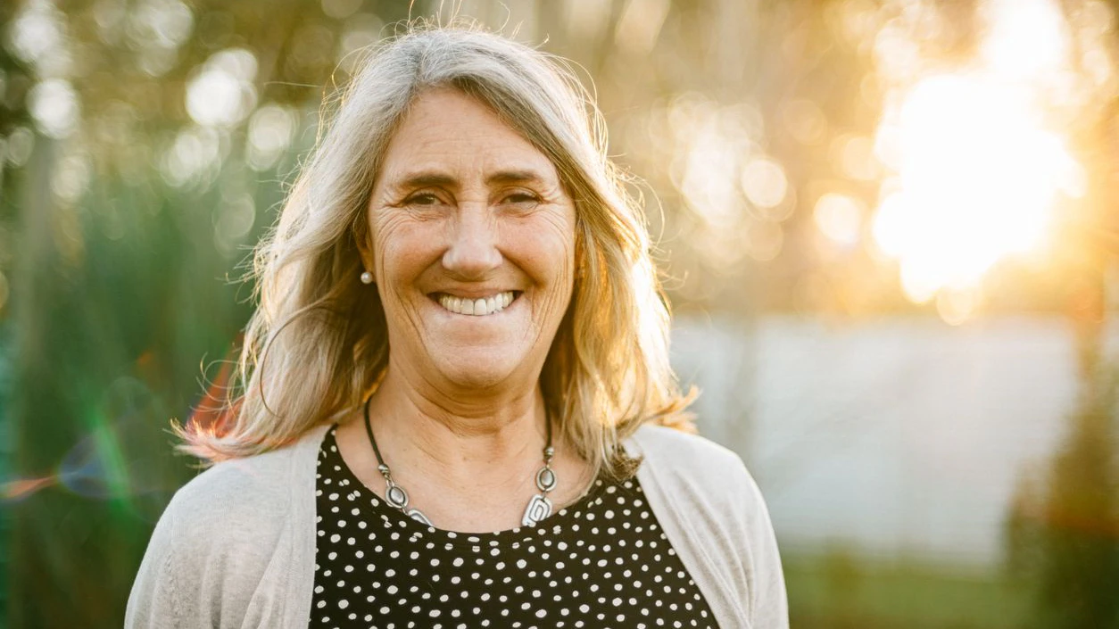 Senior woman portrait at sunset