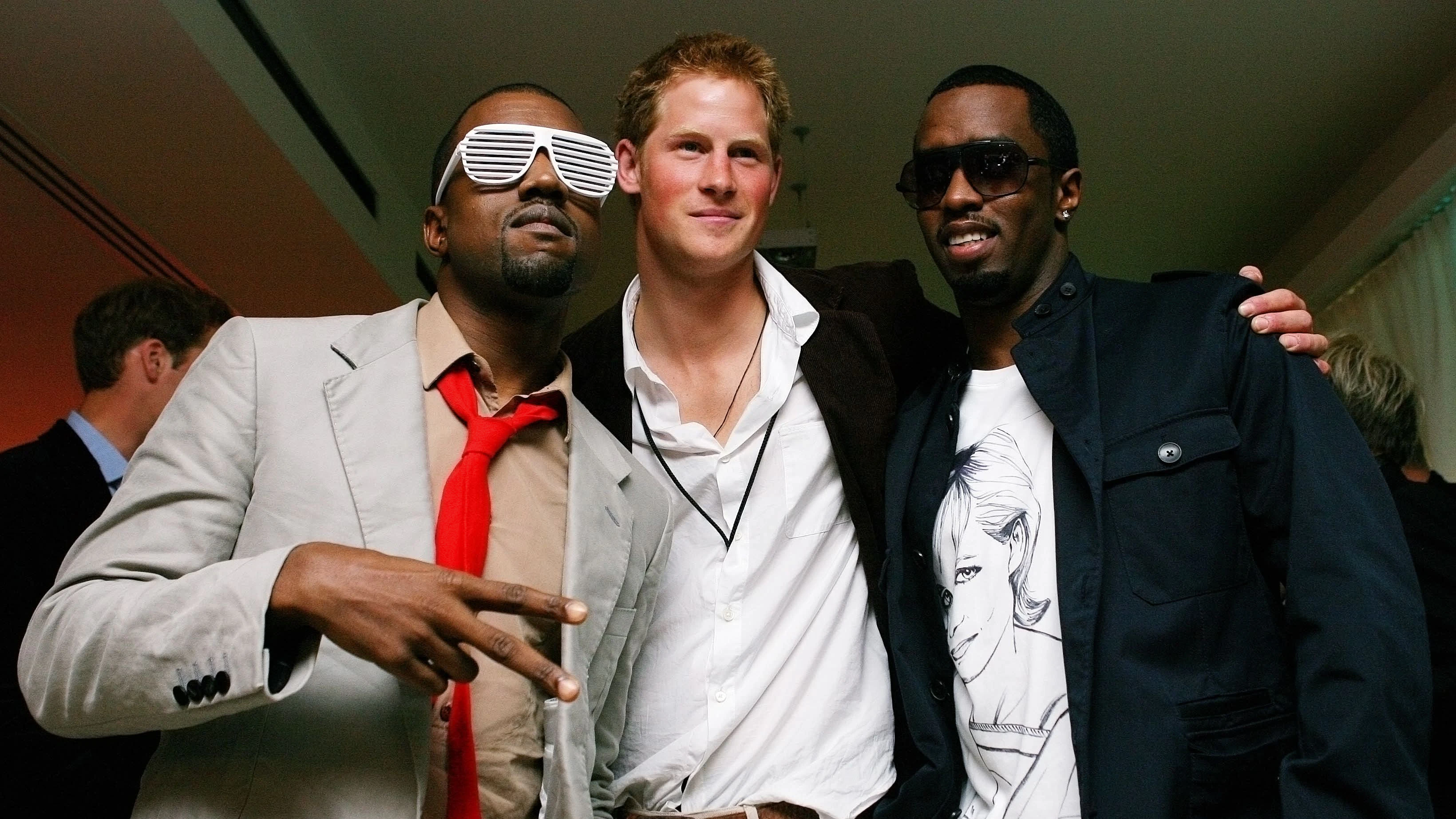 Kanye West (l.) posiert mit Prinz Harry und P. Diddy bei einer Backstage-Party nach dem Gedenkkonzert zu Ehren von Prinzessin Diana  im Wembley-Stadion in London am 1. Juli 2007.