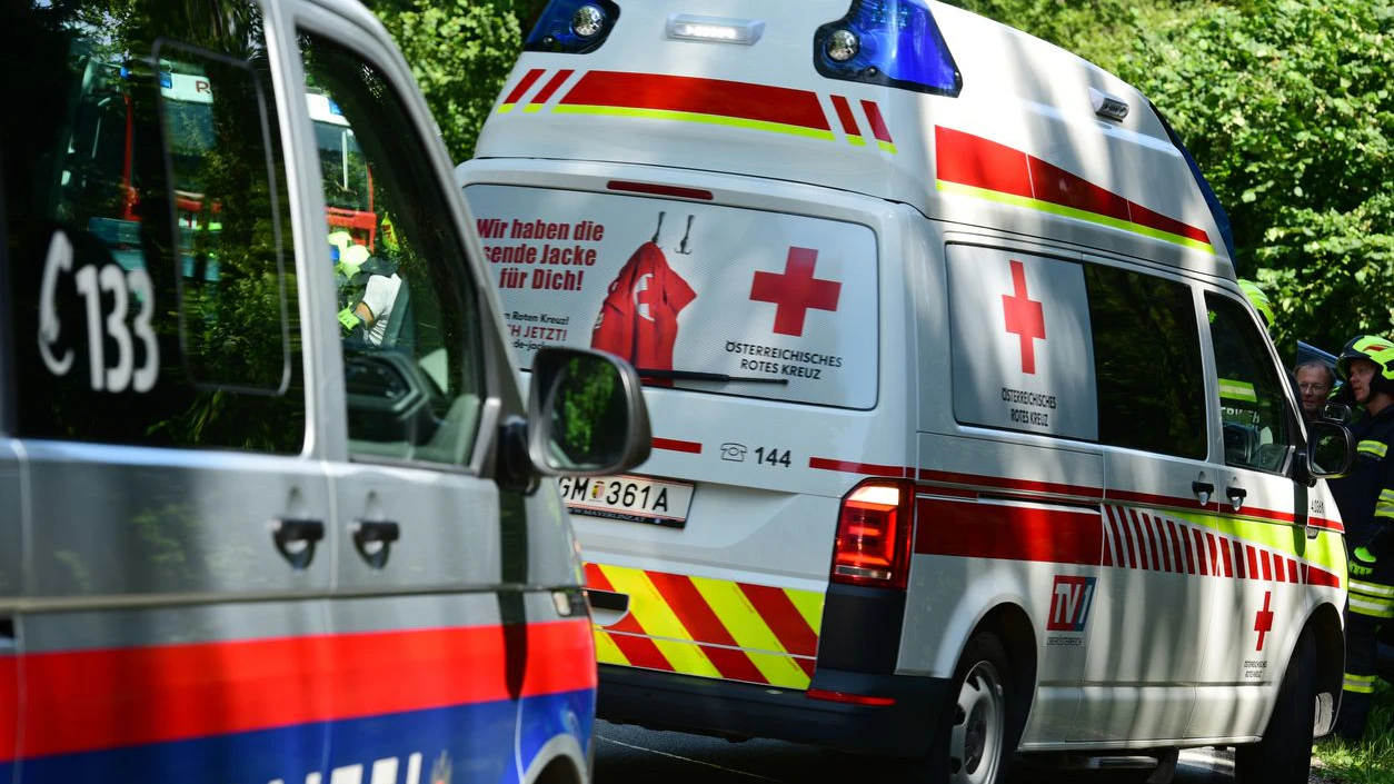 Red Cross Ambulance and a police car in Upper Austria
