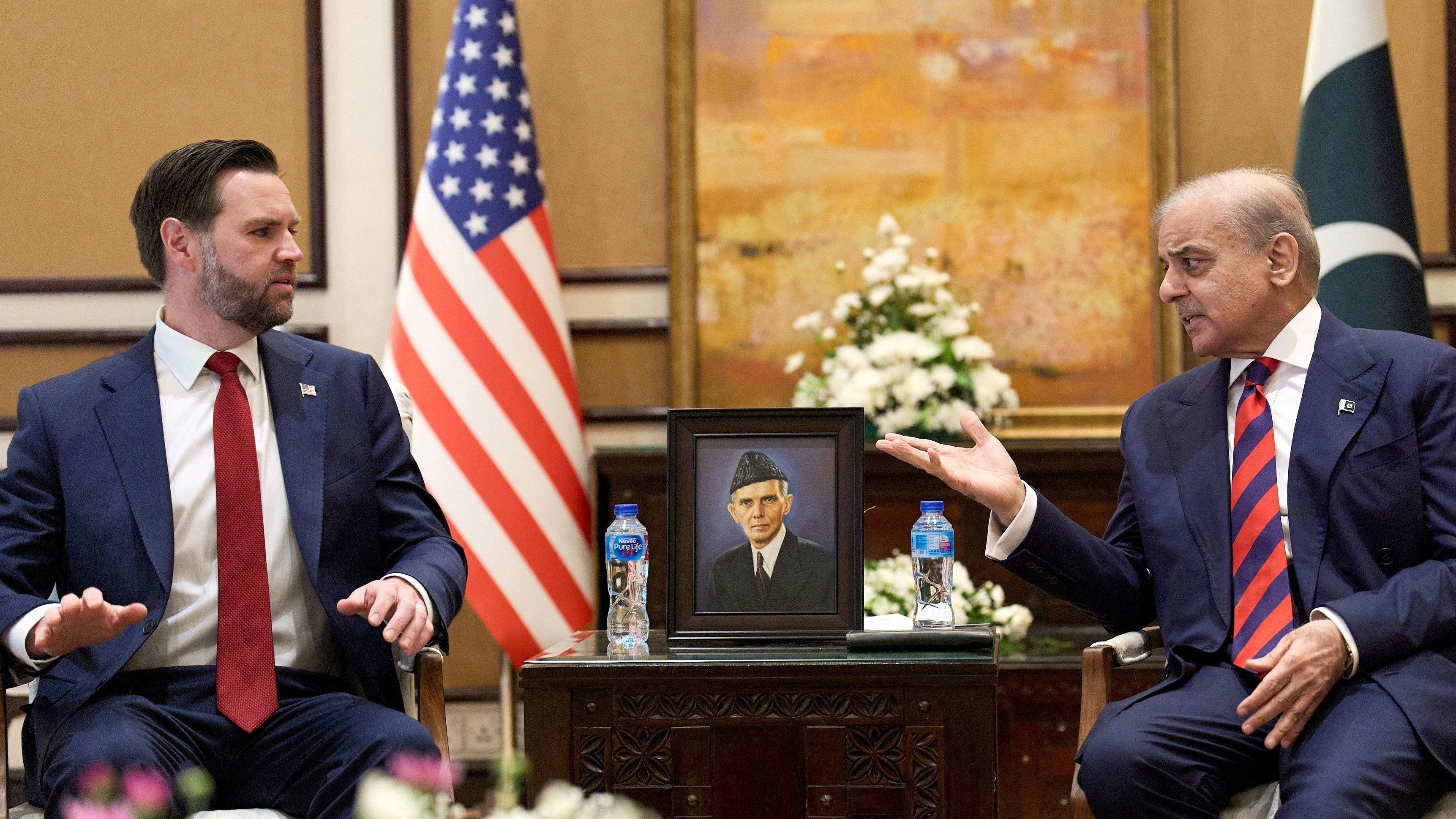 U.S. Vice President JD Vance, left, meets with Pakistan's Prime Minister Shehbaz Sharif for talks about Iran, in Islamabad, Pakistan, April 11, 2026,     Jacquelyn Martin/Pool via REUTERS