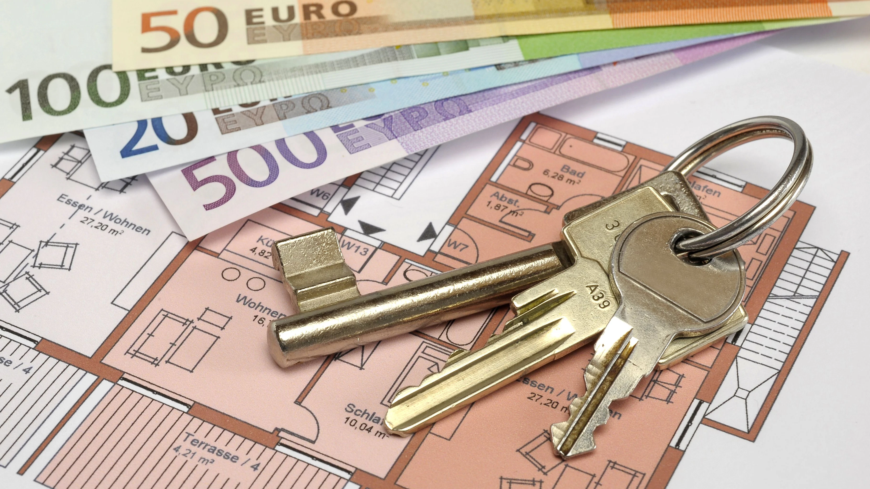 architectural blueprint plan with house key