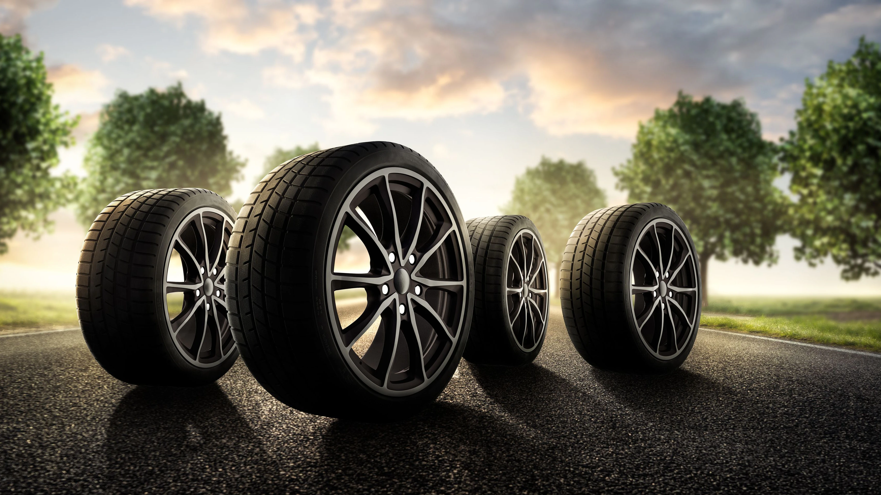 Car tires on summer country road