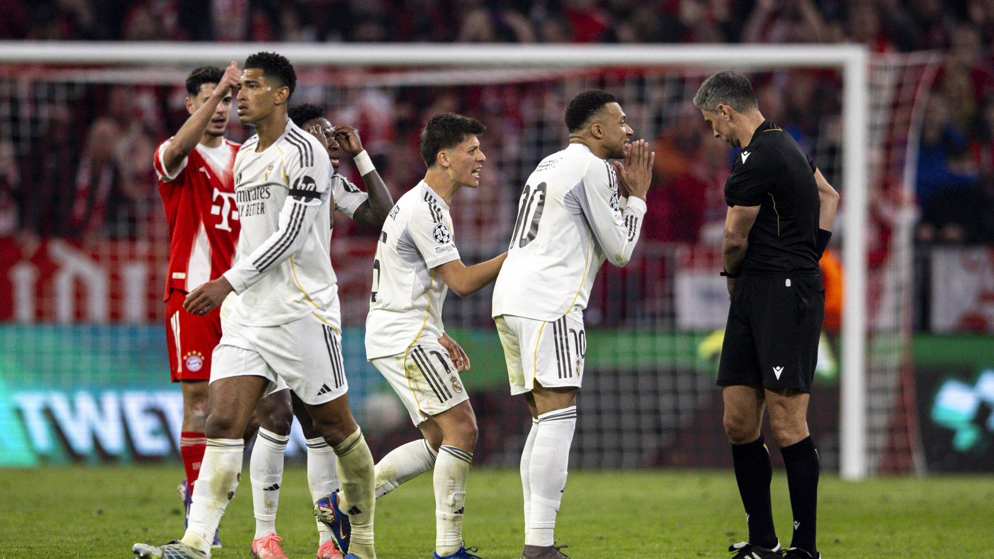 Arda Guler AND Kylian Mbappe AND Referee Slavko Vincic seen during UEFA Champions League quarterfinal game between teams of FC Bayern Munich and Real Madrid CF at Allianz Arena Germany Grzegorz Wajda/Ball Raw Images Munich Allianz Arena Germany Copyright: xGrzegorzxWajdax grzegorzwajda_uclquarterfinalbayernreal2526__506