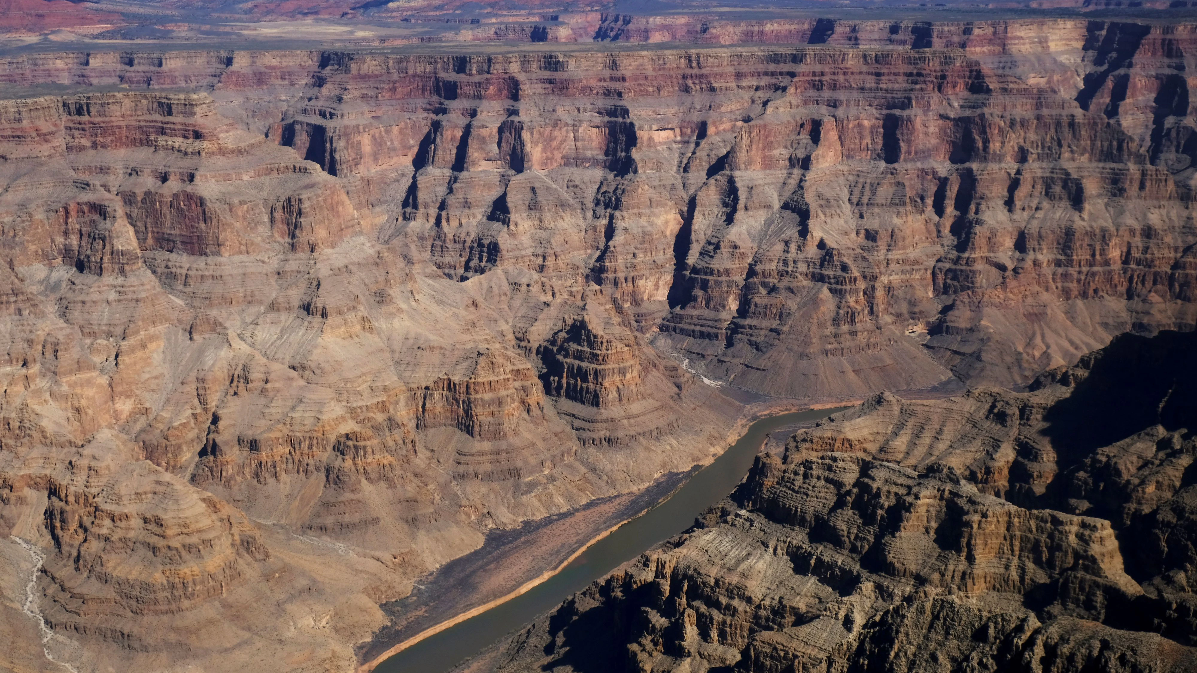 The Colorado River runs through the west rim of the Grand Canyon in Arizona, U.S. February 28, 2018.  Picture taken February 28, 2018.  REUTERS/Darrin Zammit Lupi