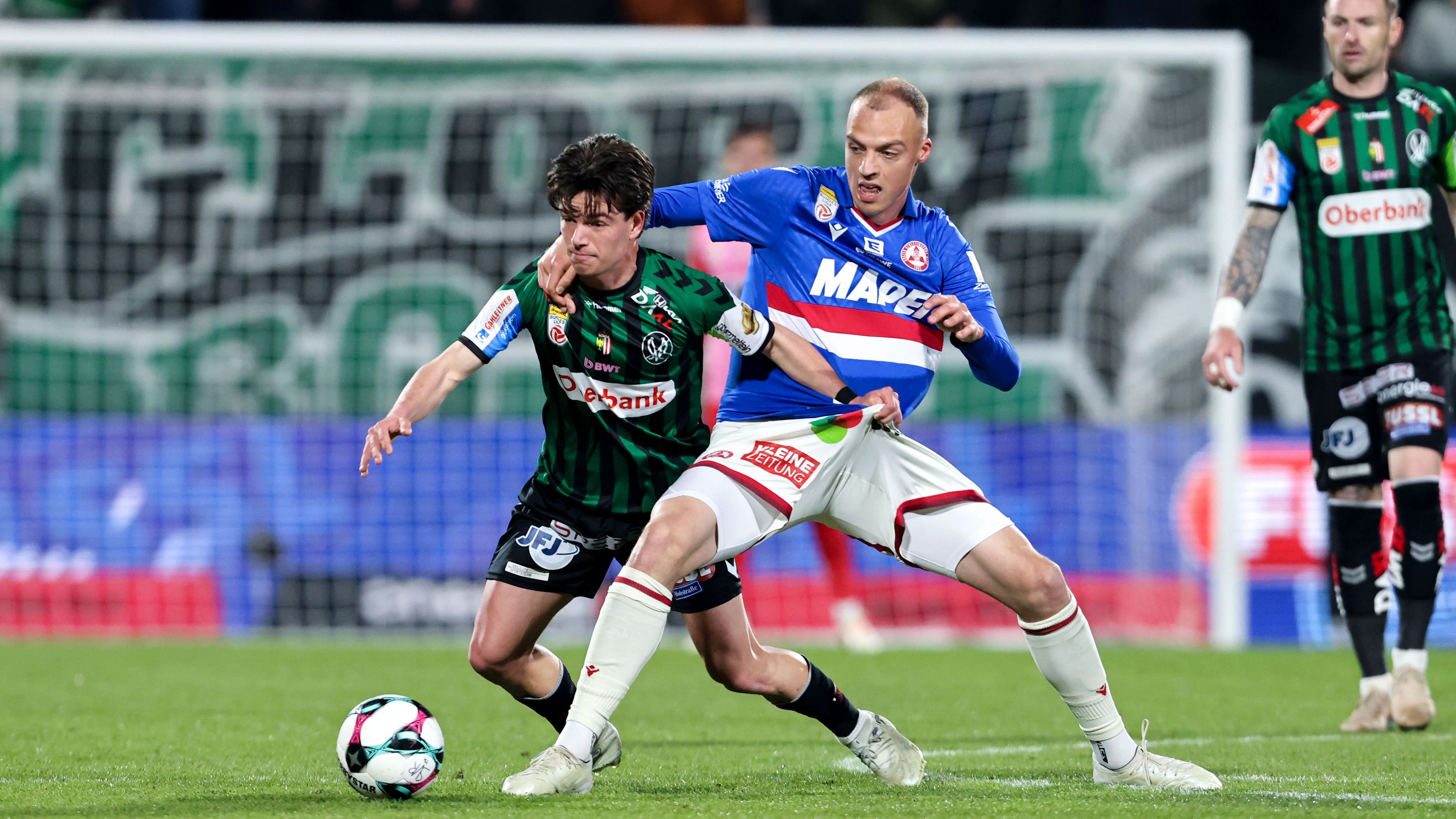 RIED,AUSTRIA,21.APR.26 - SOCCER - ADMIRAL Bundesliga, qualification group, SV Ried vs Grazer AK 1902. Image shows Nicolas Bajlicz (Ried) and Alexander Hofleitner (GAK). Photo: GEPA pictures/ Mathias Mandl