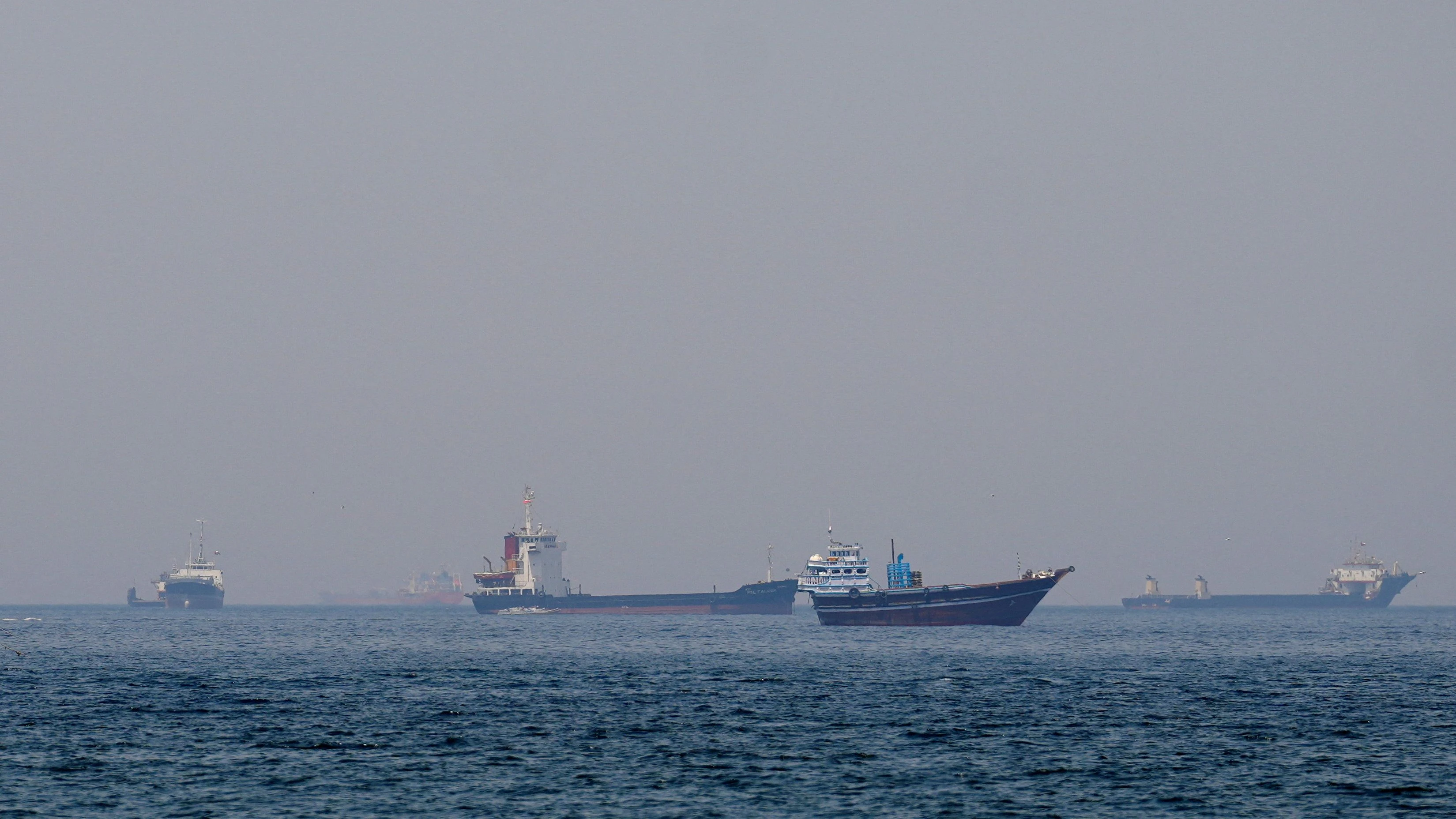 FILE PHOTO: Ships and boats in the Strait of Hormuz off the coast of Musandam, Oman, April 20, 2026. REUTERS/File Photo