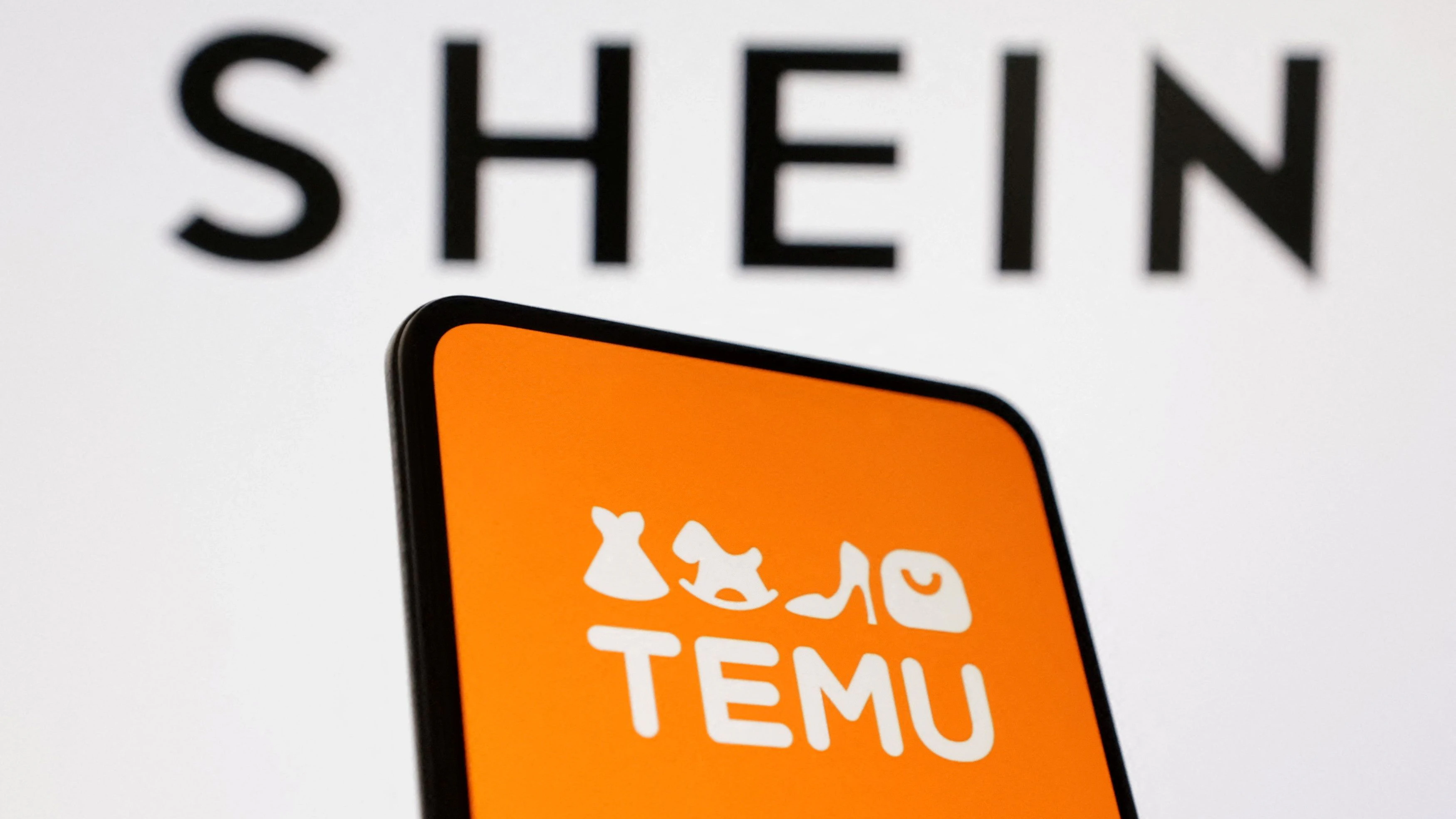 Shein and Temu logos are seen in this illustration taken August 22, 2024. REUTERS/Dado Ruvic/Illustration