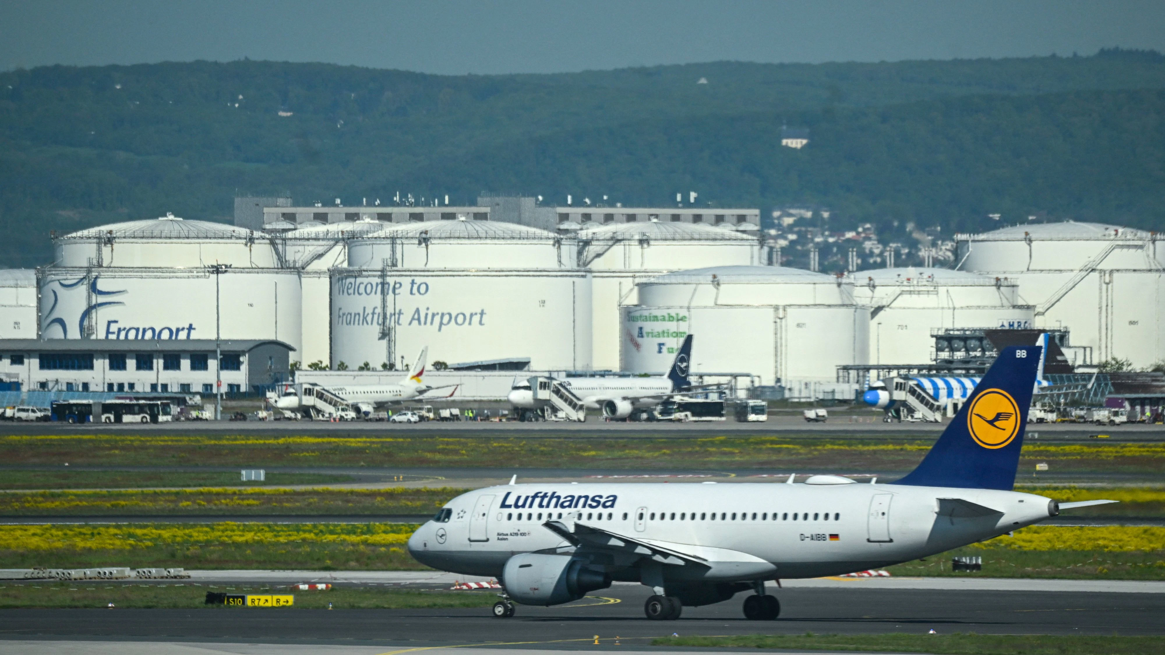 A Lufthansa plane moves on the runway near Kerosene tanks on the day of the official inauguration ceremony of Terminal 3 at Frankfurt Airport, in Frankfurt, Germany, April 22, 2026. REUTERS/Jana Rodenbusch