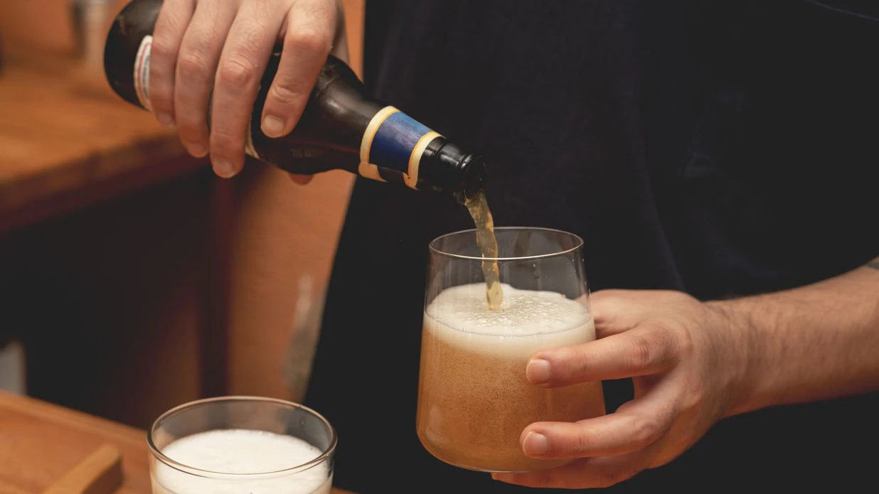 man pouring beer from bottle into glass, beer, bottle, glass