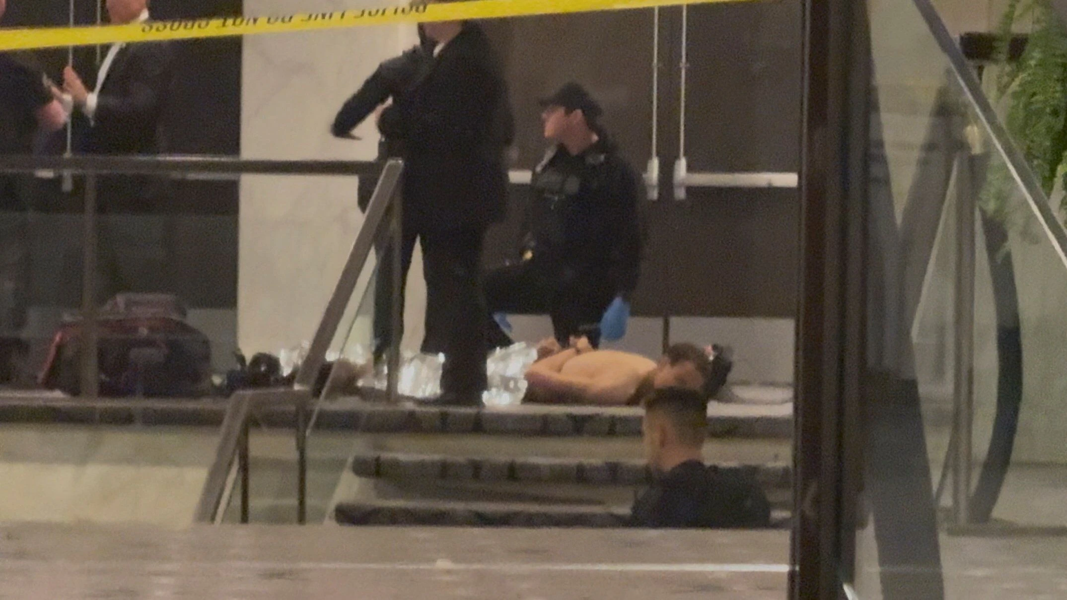 Cole Tomas Allen, a suspect in the shooting incident at the White House Correspondents' Association dinner, lies on the floor after being detained by law enforcement personnel, in Washington, D.C., U.S., April 25, 2026, in this screengrab from a video. Bill Frischling/ CQ Roll Call/Handout via REUTERS    THIS IMAGE HAS BEEN SUPPLIED BY A THIRD PARTY. NO RESALES. NO ARCHIVES. MANDATORY CREDIT.   VERIFICATION Reuters was able to verify the location from flooring, lights, television, and windows that match corroborating footage. Reuters was able to confirm the date from file data. The armed man fired at a Secret Service agent, an FBI official told Reuters.