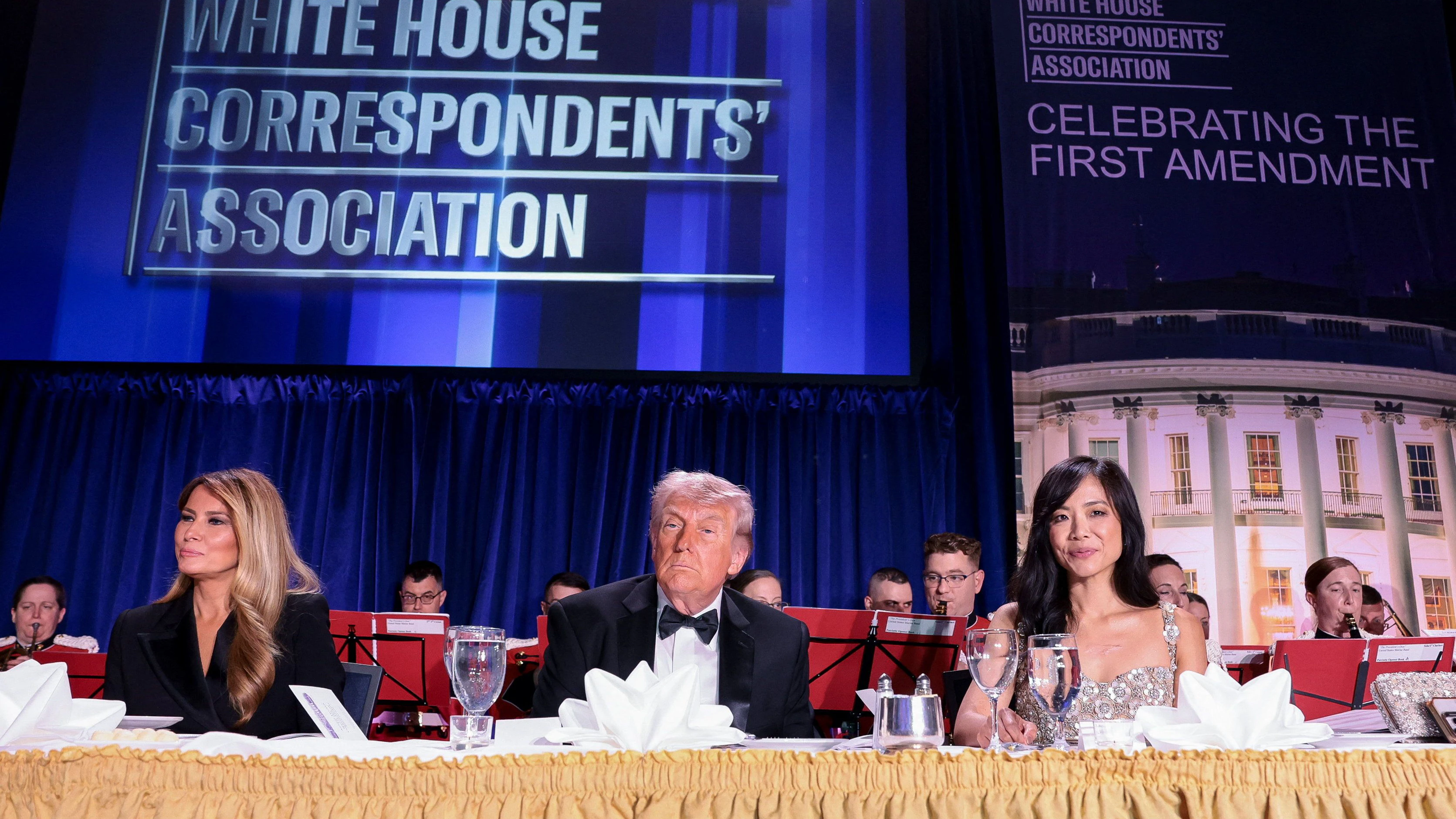 U.S. President Donald Trump, first lady Melania Trump and CBS News senior White House correspondent Weijia Jiang attend the annual White House Correspondents' Association dinner in Washington, D.C., U.S., April 25, 2026. REUTERS/Jonathan Ernst