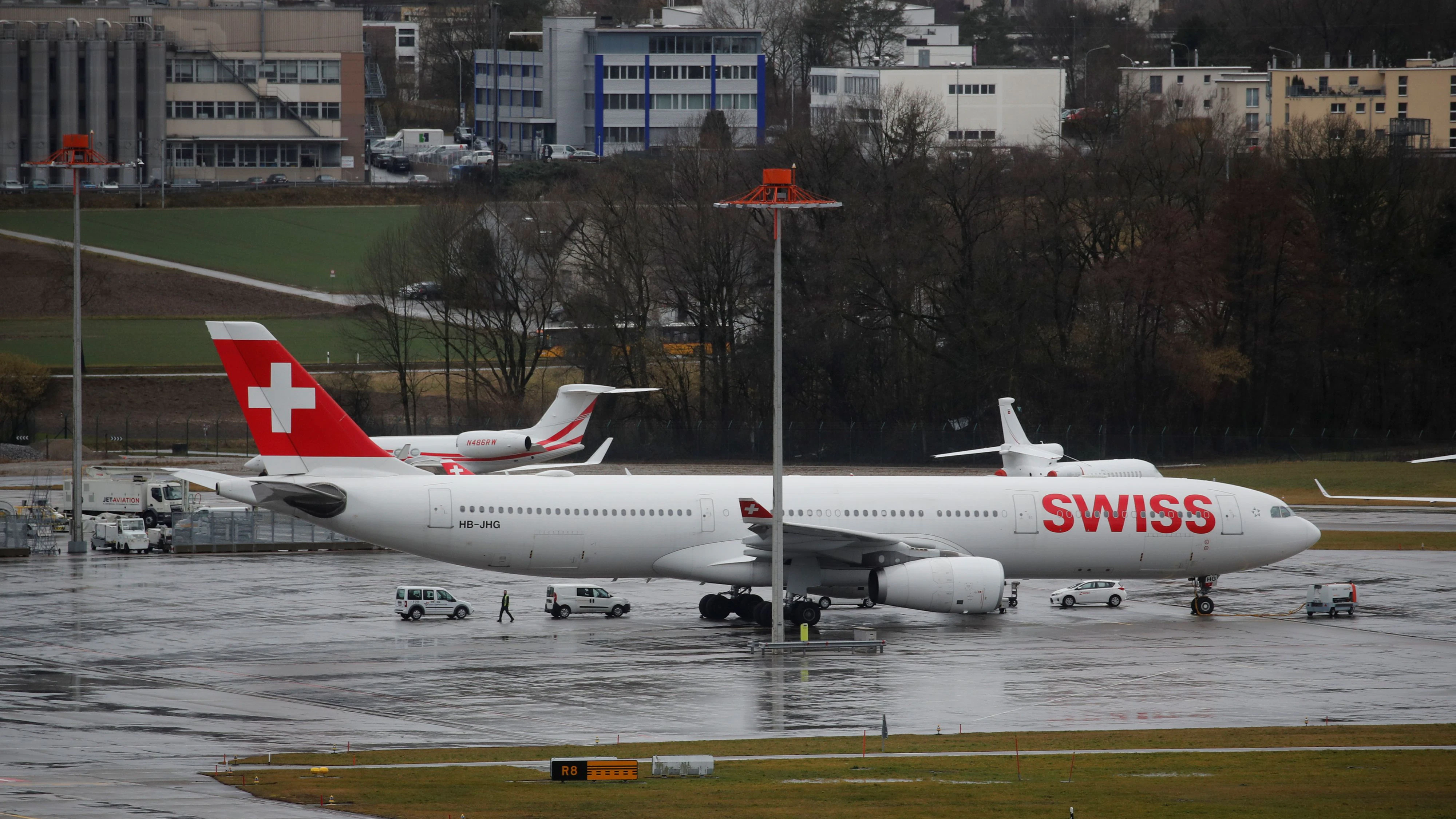 An Airbus A330-343 of Swiss Airlines is parked at the airport in Zurich, Switzerland February 3, 2020. REUTERS/Arnd Wiegmann