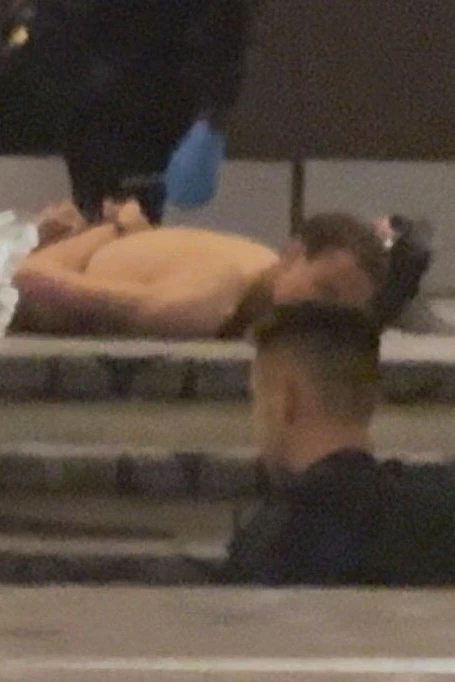 Der mutmaßliche Attentäter von Washington, ein 31-jähriger Lehrer aus Kalifornien, liegt gefesselt am Boden des Hilton Hotels