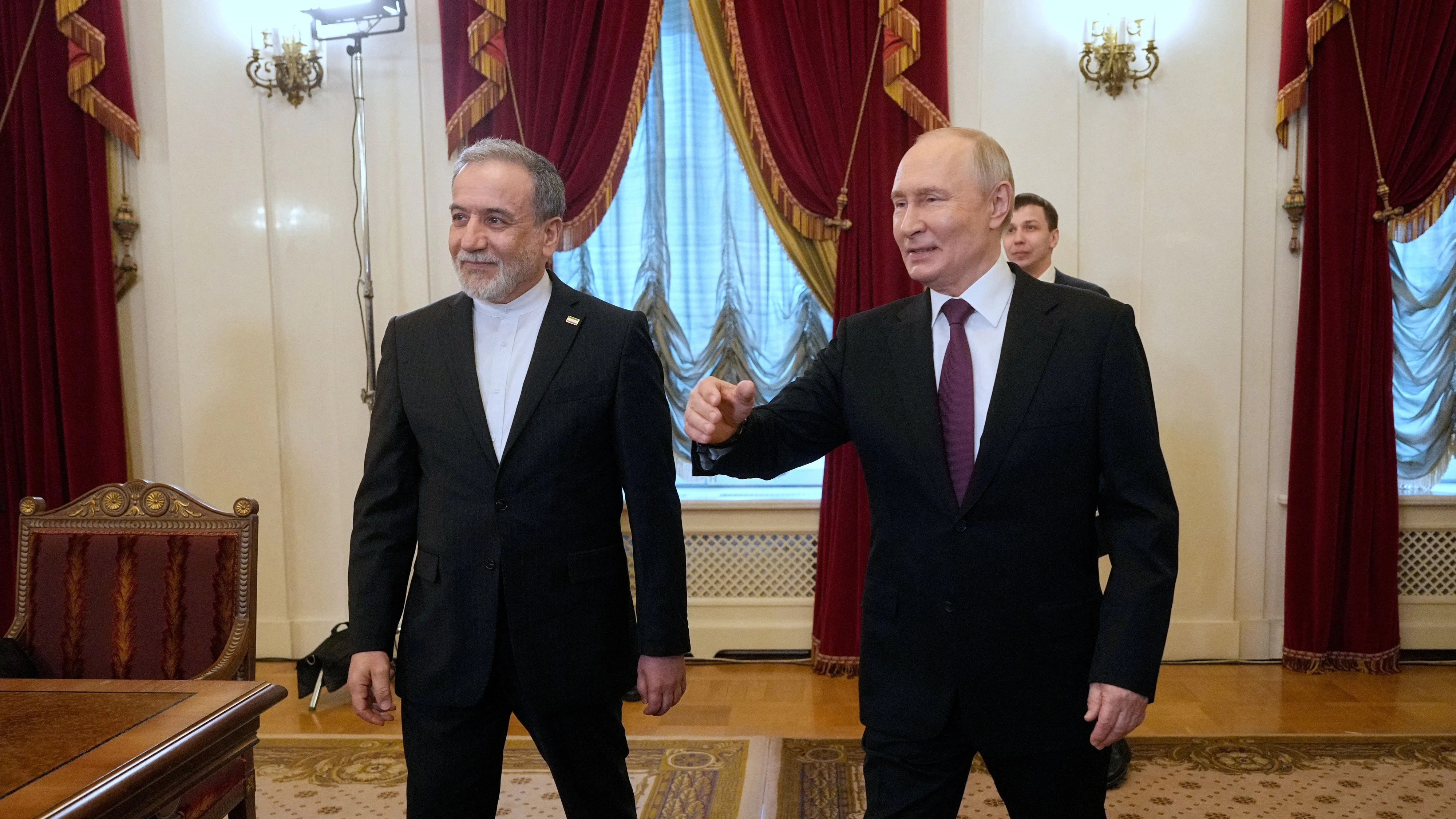 Russian President Vladimir Putin and Iranian Foreign Minister Abbas Araqchi attend a meeting at the Boris Yeltsin Presidential Library in Saint Petersburg, Russia April 27, 2026. Dmitri Lovetsky/Pool via REUTERS