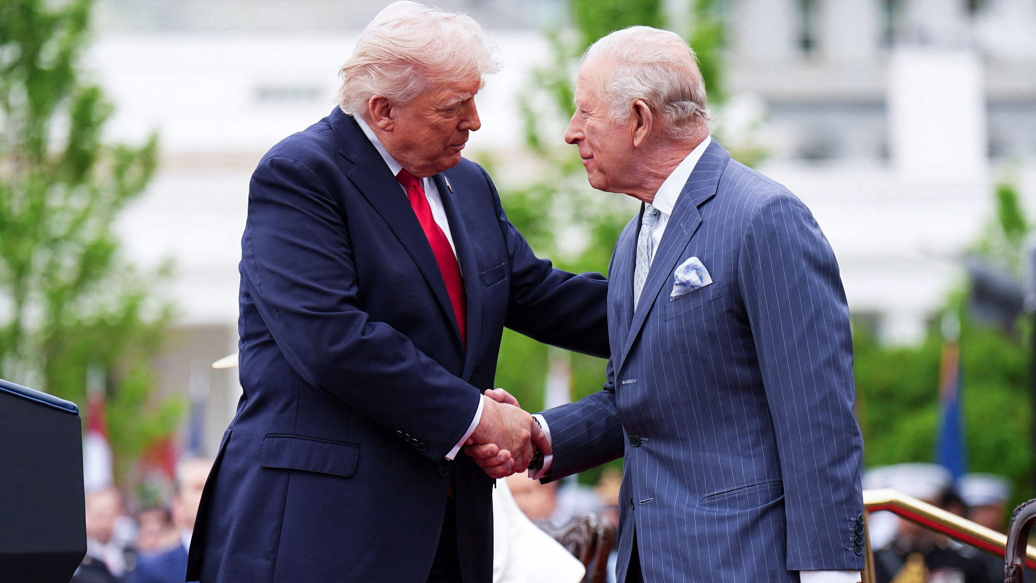 US President Donald Trump shakes the hand of King Charles III after speaking during the ceremonial welcome of Charles and Queen Camilla on the South Lawn of the White House, Washington DC, on day two of the state visit to the US. Picture date: Tuesday April 28, 2026.    Aaron Chown/Pool via REUTERS