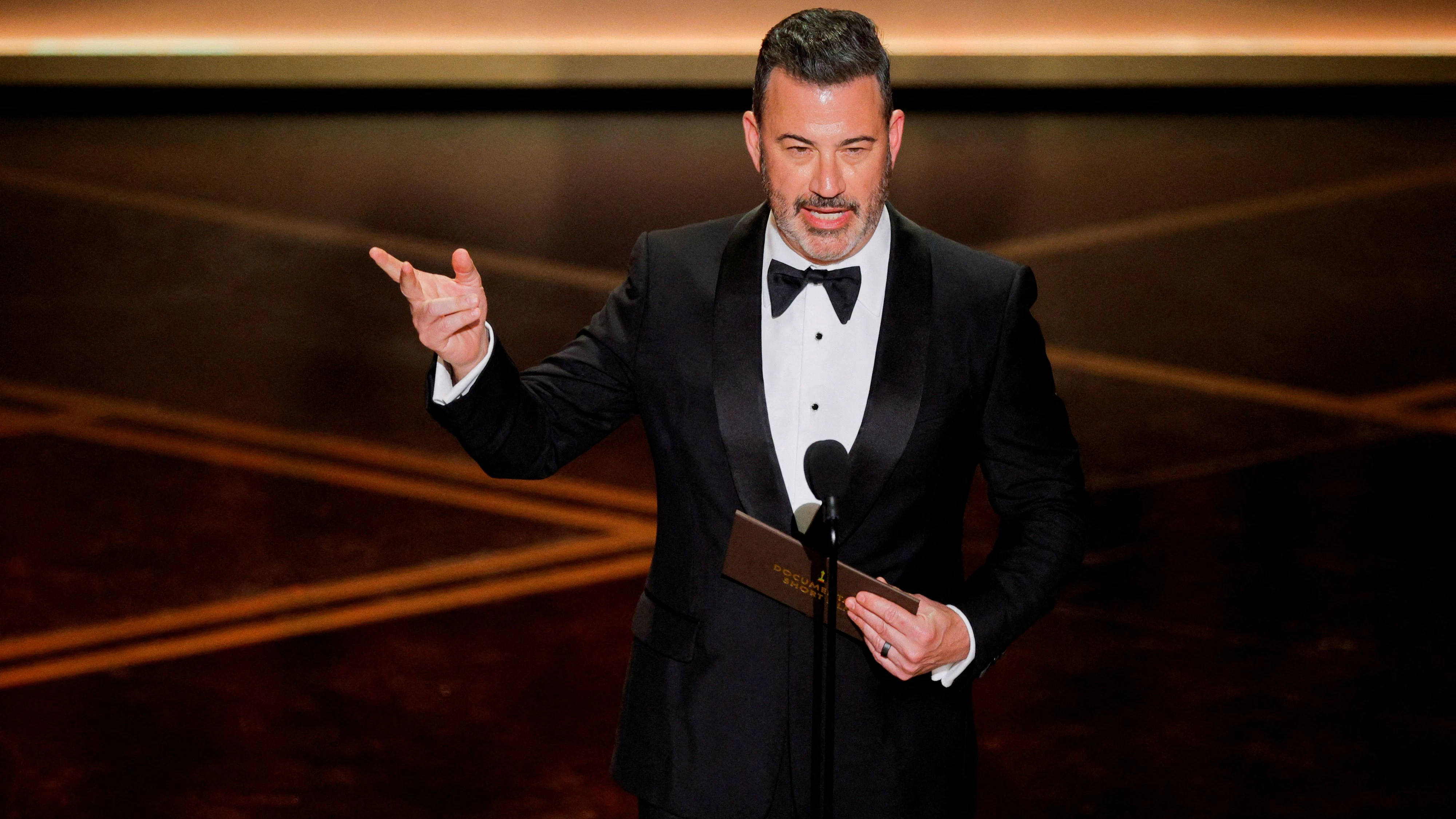 FILE PHOTO: Jimmy Kimmel speaks onstage during the Oscars show at the 98th Academy Awards in Hollywood, Los Angeles, California, U.S., March 15, 2026. REUTERS/Mike Blake/File Photo