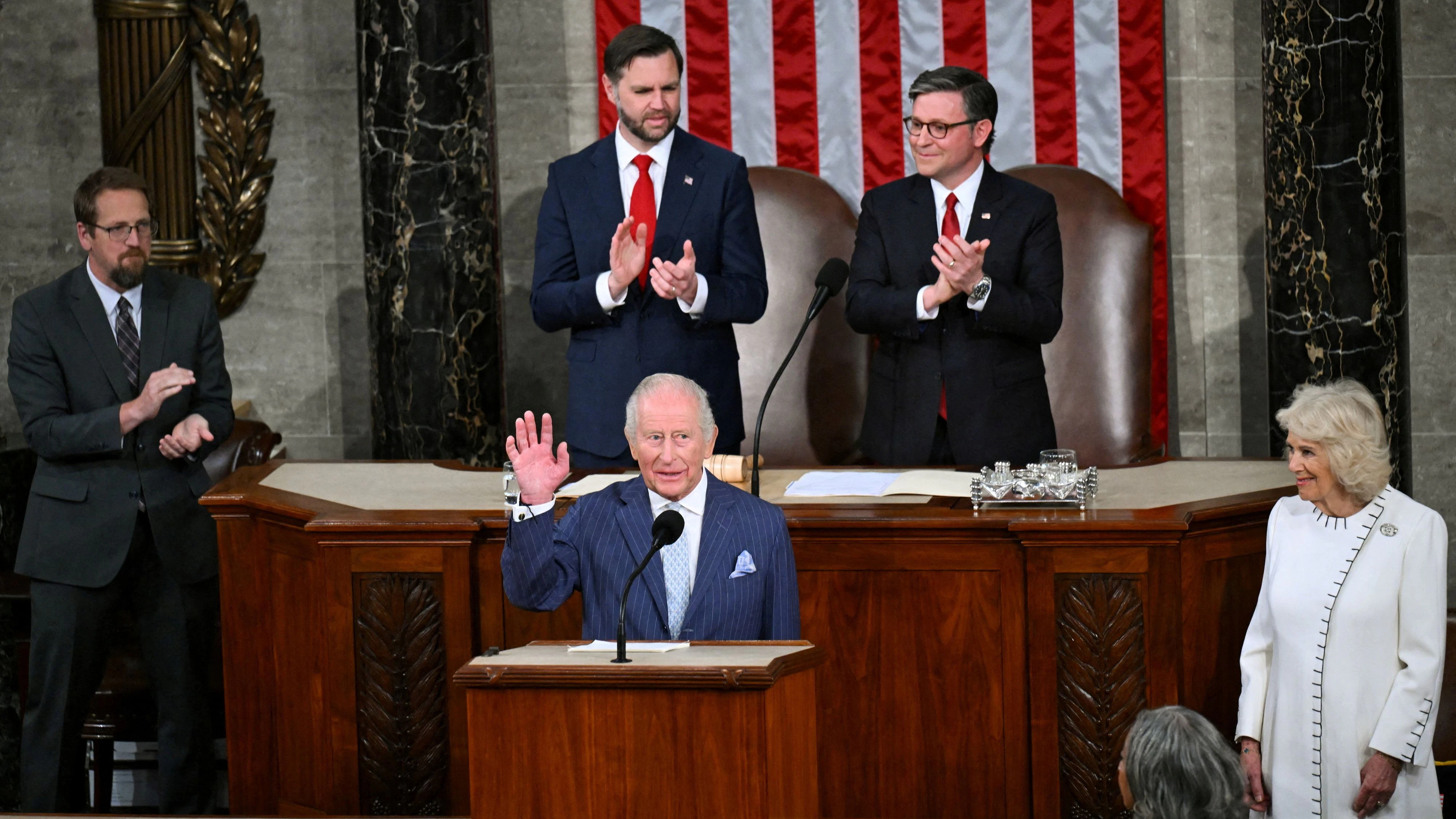U.S. Vice President JD Vance and and U.S. House Speaker Mike Johnson (R-LA) applaud as Britain's King Charles and Queen Camilla attend a joint meeting of Congress in the House Chamber of the U.S. Capitol in Washington, D.C., U.S., April 28, 2026. REUTERS/Matt McClain     TPX IMAGES OF THE DAY     