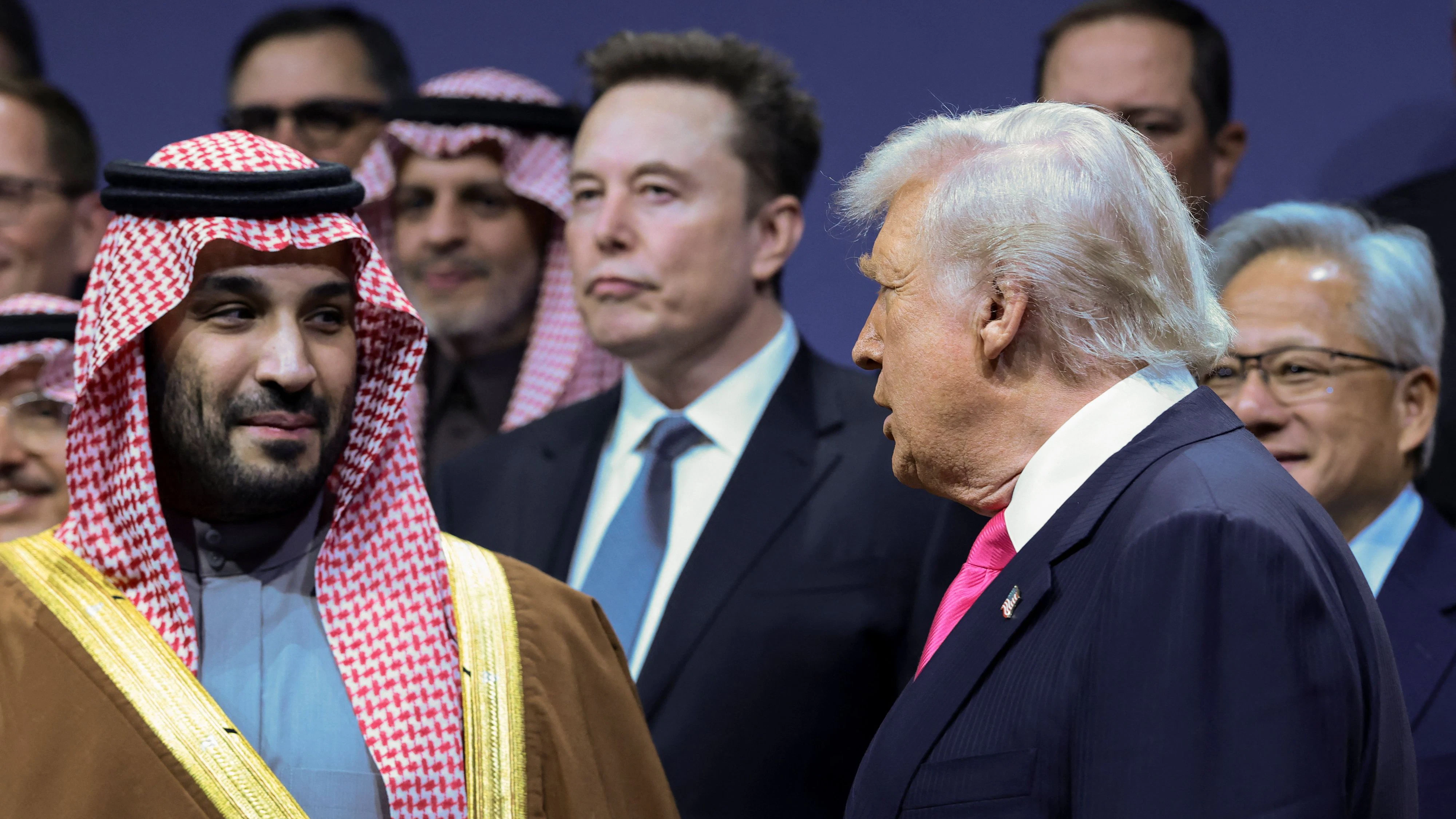 U.S. President Donald Trump, Crown Prince and Prime Minister Mohammed bin Salman of Saudi Arabia, Jensen Huang, CEO of Nvidia, and Elon Musk attend the U.S.-Saudi Investment Forum in Washington, D.C., U.S., November 19, 2025. REUTERS/Evelyn Hockstein