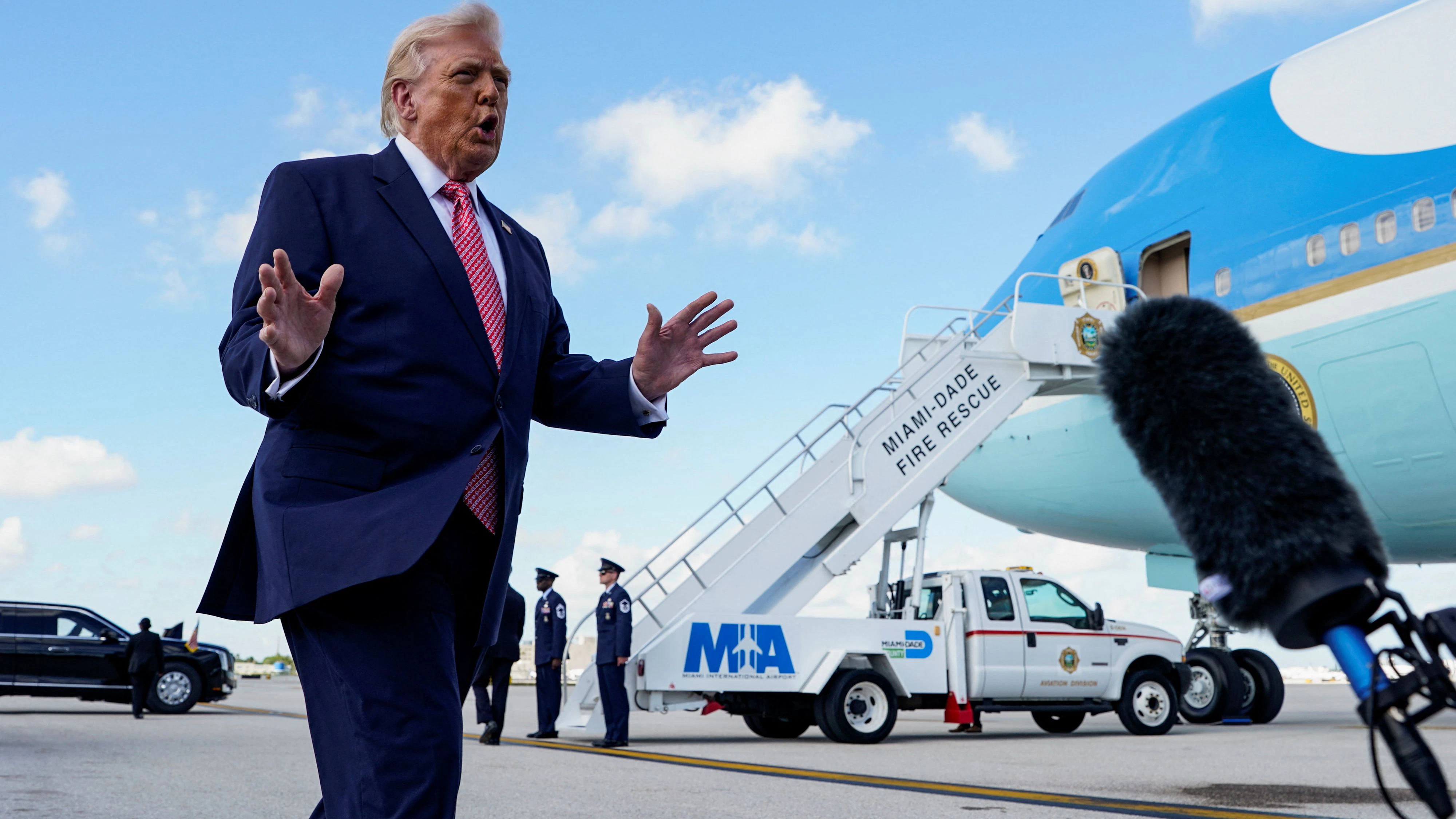 U.S. President Donald Trump speaks to the media as he arrives at Miami International Airport in Miami, Florida, U.S., March 27, 2026. REUTERS/Elizabeth Frantz  