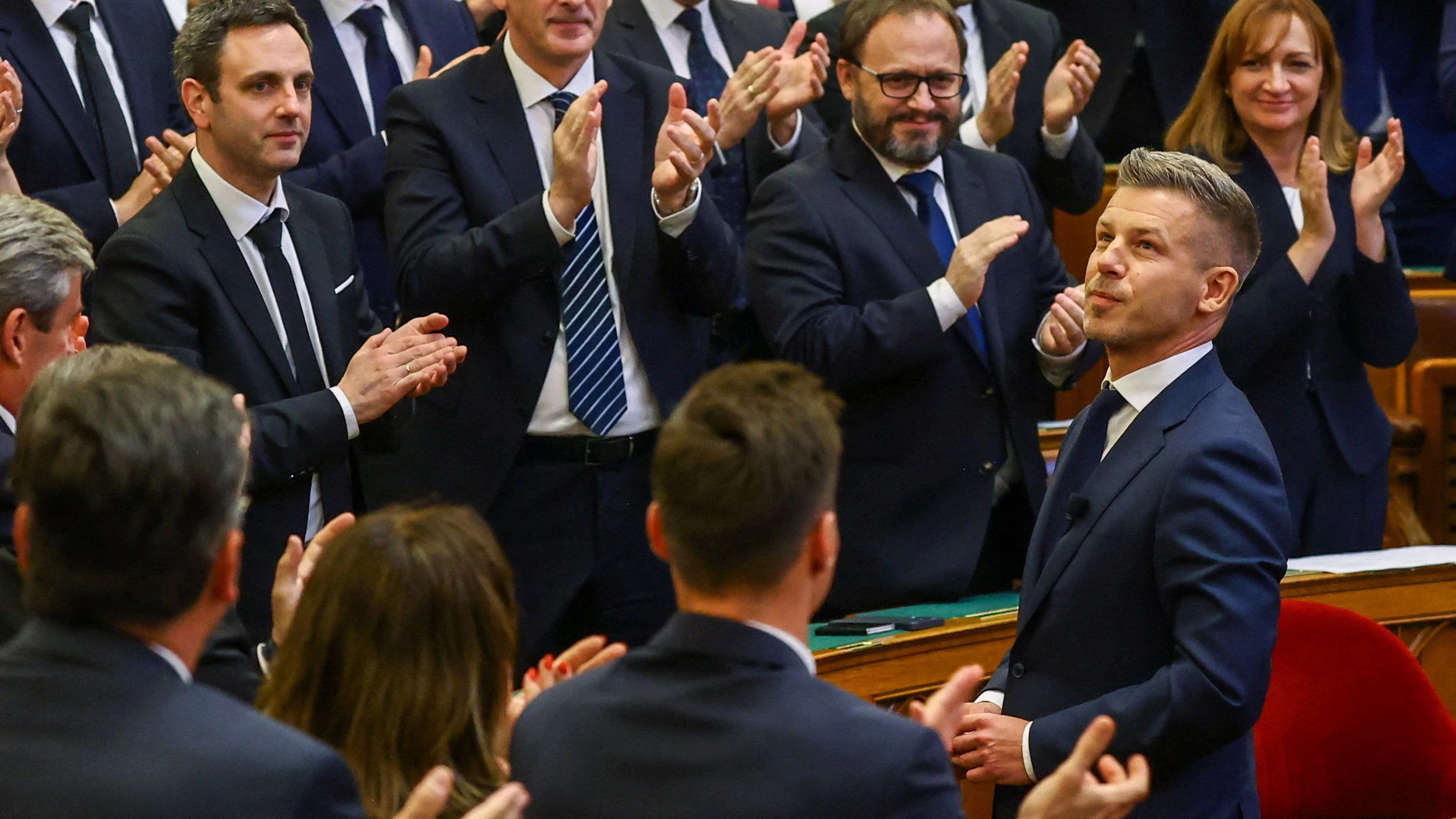 Peter Magyar receives a standing ovation as he becomes Hungary's new Prime Minister, at the Parliament in Budapest, Hungary, May 9, 2026. REUTERS/Bernadett Szabo 