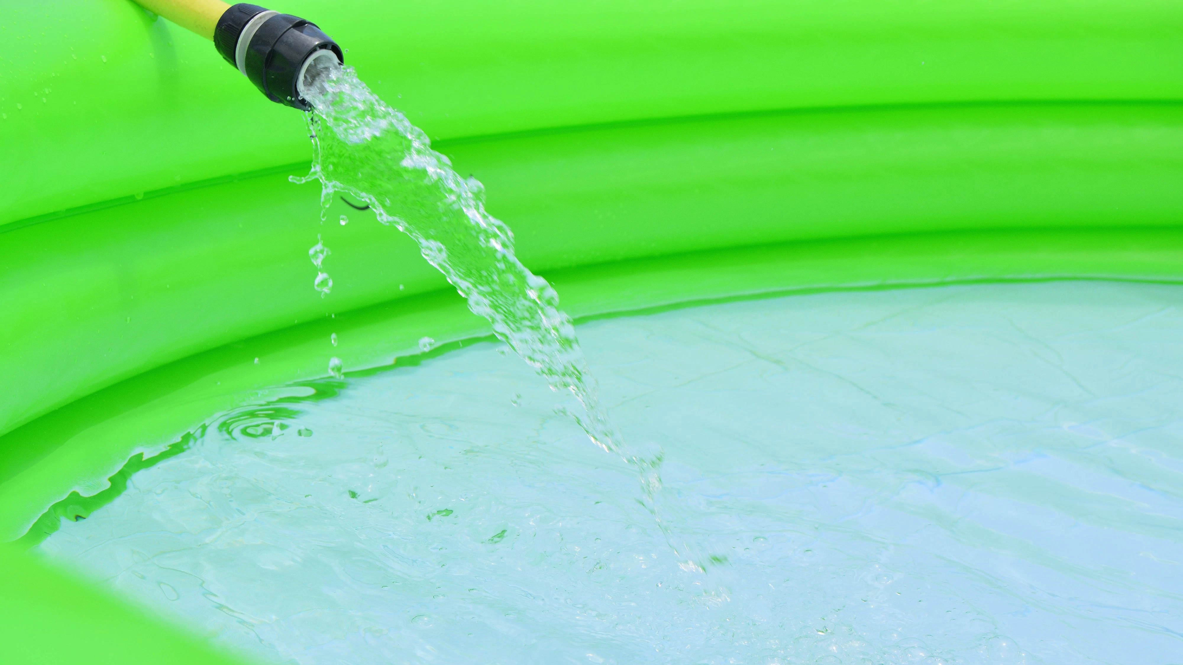 Inflatable swimming pool full of water with various children s games Inflatable swimming pool full of water with various children s games Copyright: xZoonar.com/Solosergiox 10997641