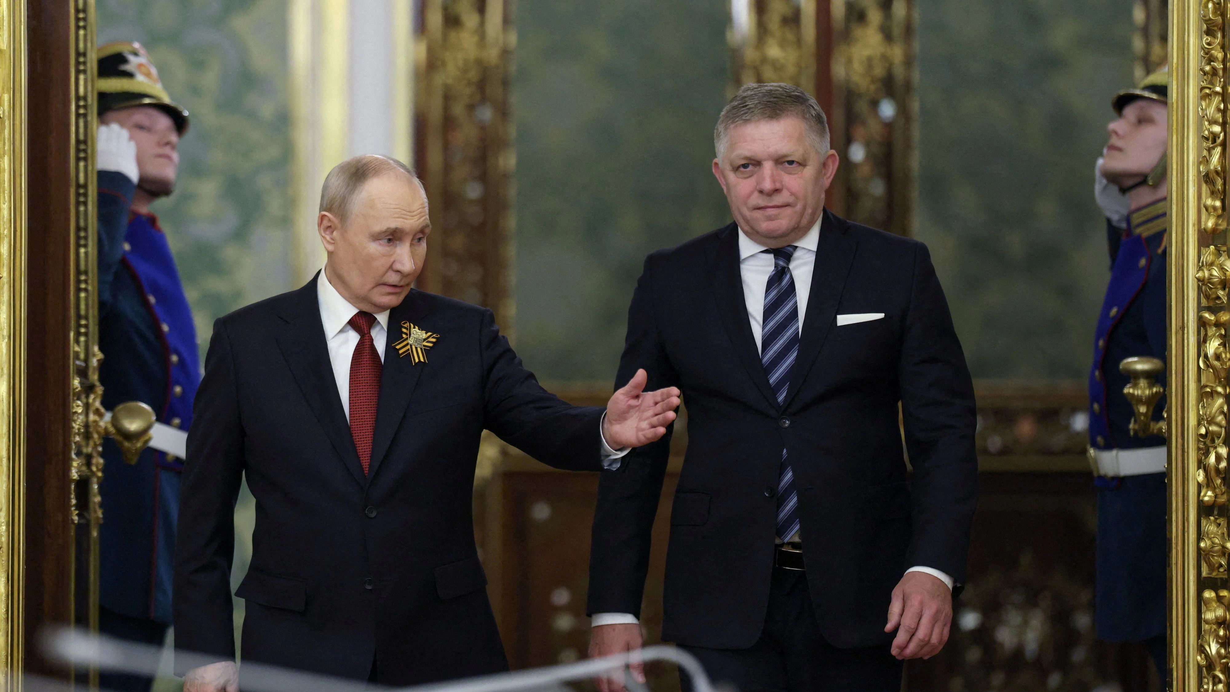 Russian President Vladimir Putin shows the way to Slovak Prime Minister Robert Fico during a meeting in Moscow, Russia May 9, 2026. REUTERS/Ramil Sitdikov/Pool     TPX IMAGES OF THE DAY     