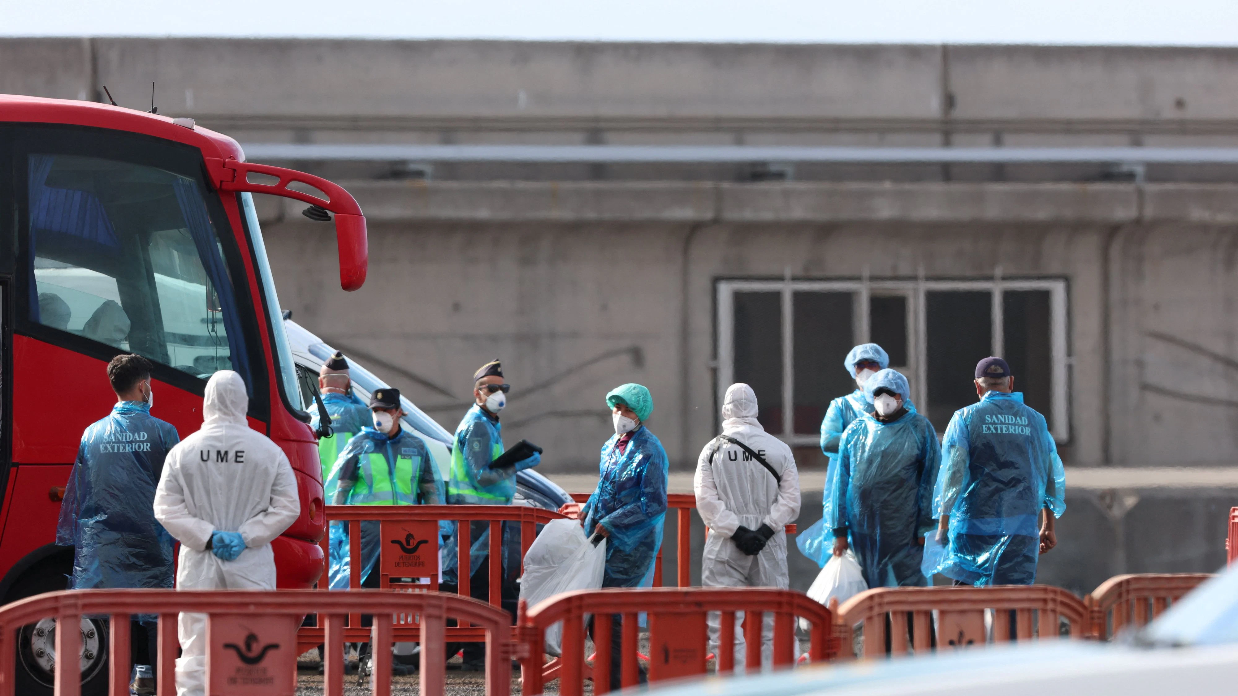 Passengers from the cruise ship MV Hondius affected by a hantavirus outbreak, board a bus at the port of Granadilla de Abona, in Tenerife, Spain, May 10, 2026. REUTERS/Hannah McKay