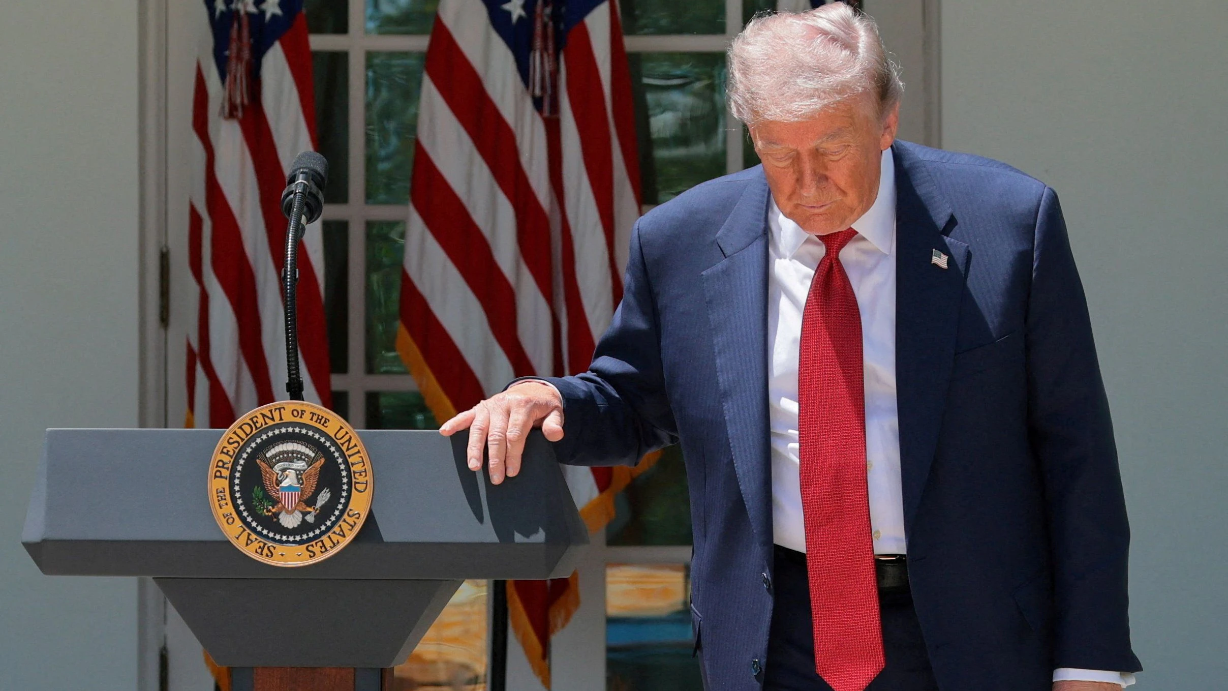 U.S. President Donald Trump attends a Mother’s Day reception for Gold Star mothers, whose children died while serving in the U.S. armed forces, and also to mothers the White House is describing as 'Angel Mothers’ who are the parents of people killed by immigrants in the U.S. illegally, in the Rose Garden at the White House in Washington, D.C., U.S., May 8, 2026. REUTERS/Jonathan Ernst     TPX IMAGES OF THE DAY     