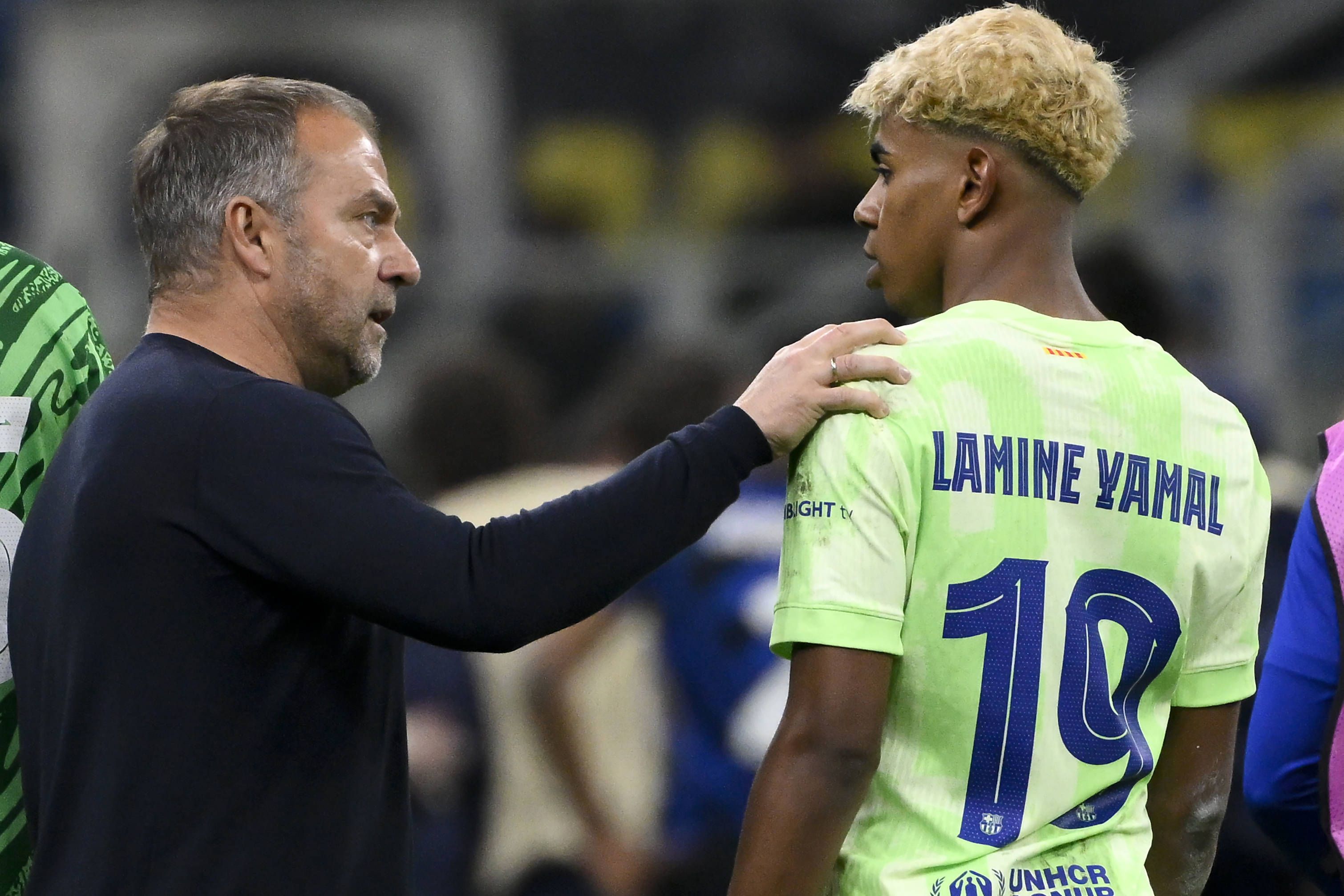 Hansi Flick und Lamine Yamal 