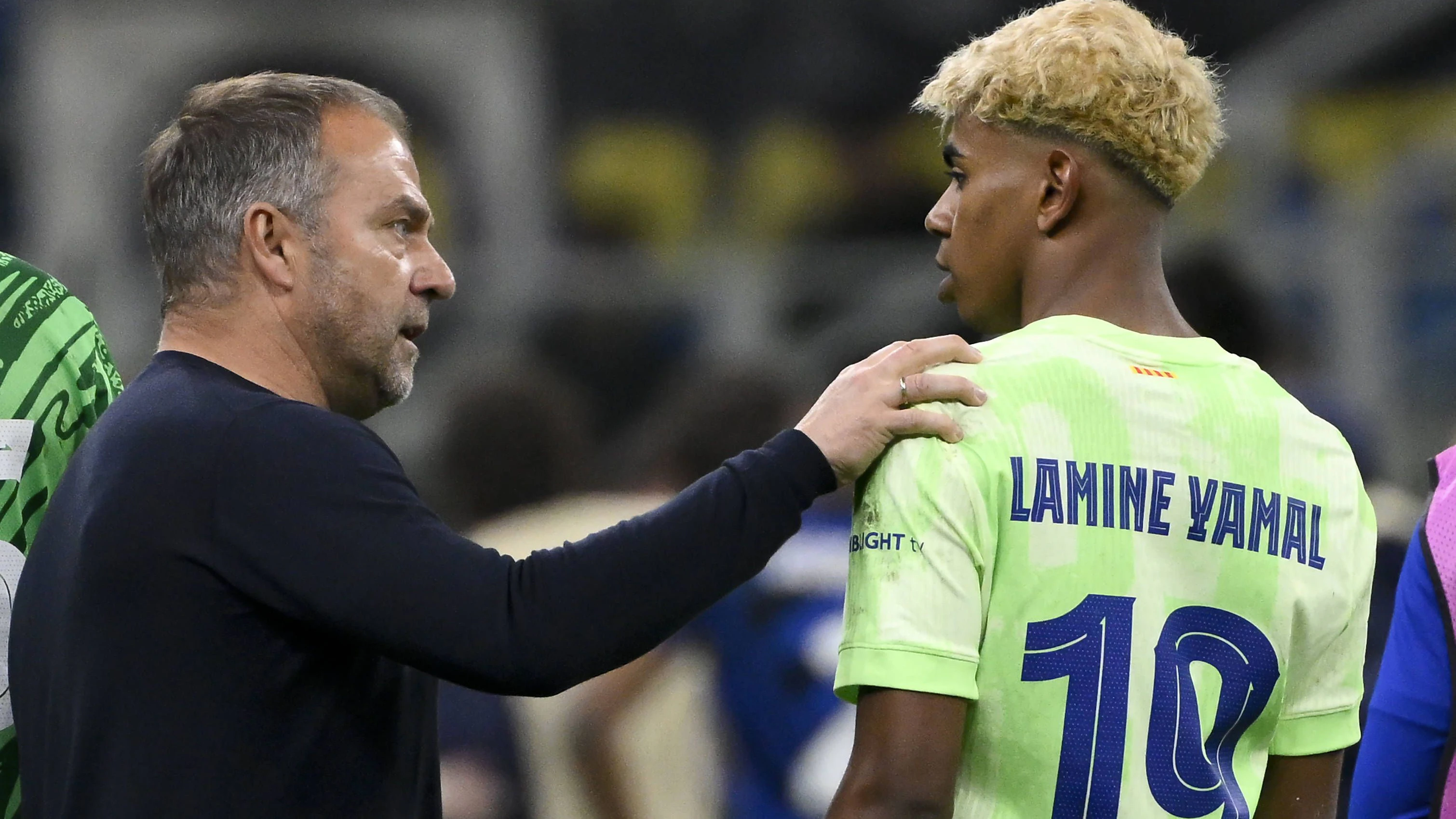 Hansi Flick und Lamine Yamal 