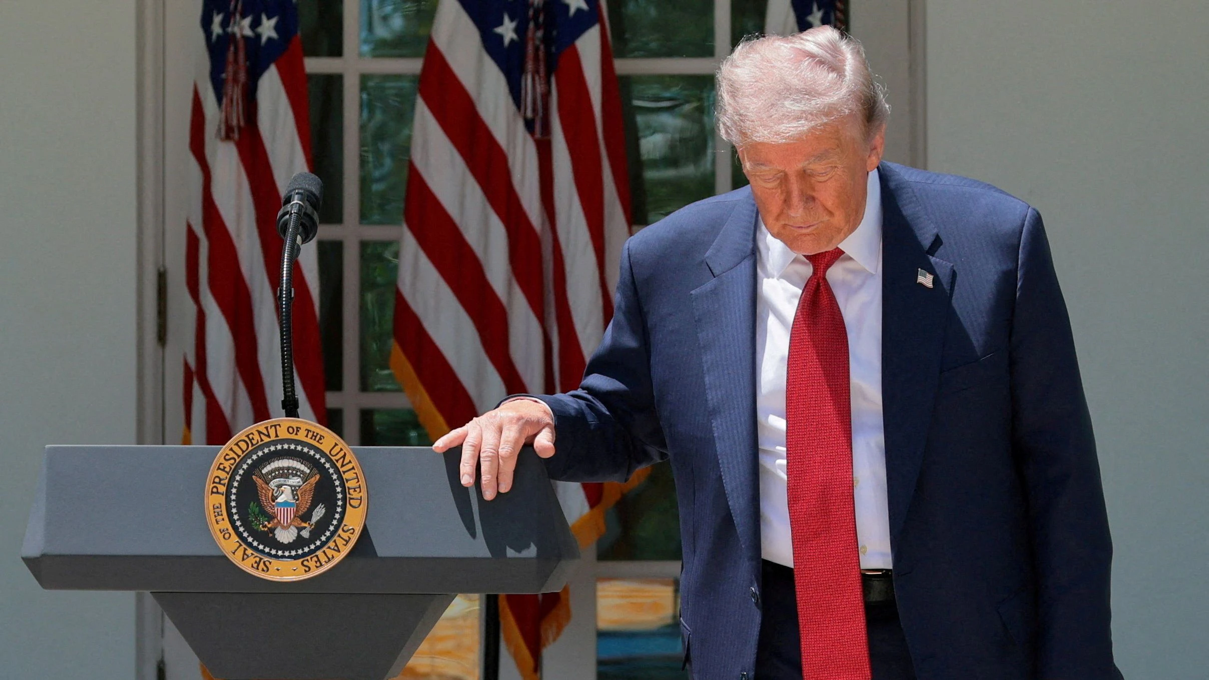 FILE PHOTO: U.S. President Donald Trump attends a Mother’s Day reception for Gold Star mothers, whose children died while serving in the U.S. armed forces, and also to mothers the White House is describing as 'Angel Mothers’ who are the parents of people killed by immigrants in the U.S. illegally, in the Rose Garden at the White House in Washington, D.C., U.S., May 8, 2026. REUTERS/Jonathan Ernst     TPX IMAGES OF THE DAY/File Photo