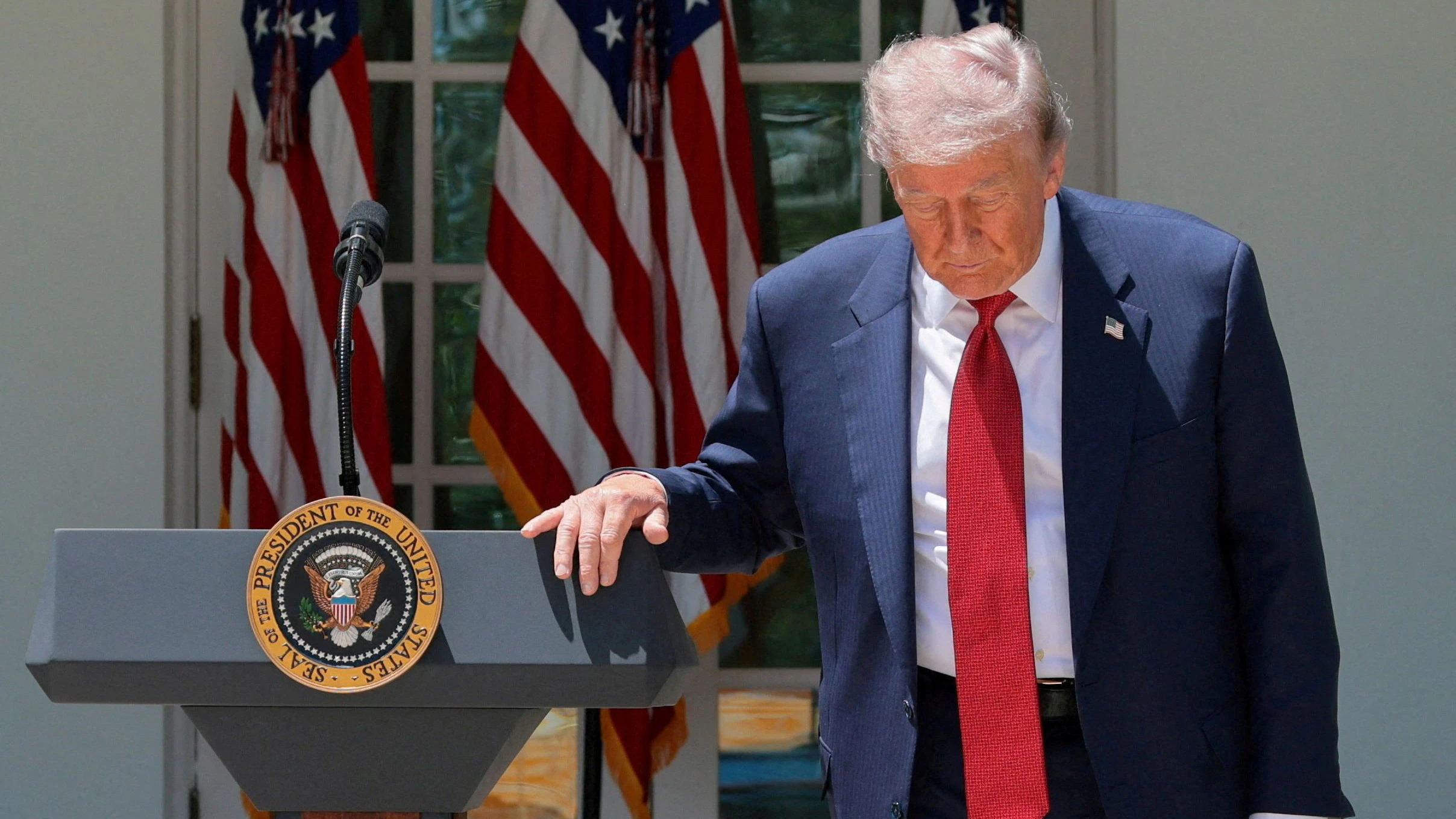 FILE PHOTO: U.S. President Donald Trump attends a Mother’s Day reception for Gold Star mothers, whose children died while serving in the U.S. armed forces, and also to mothers the White House is describing as 'Angel Mothers’ who are the parents of people killed by immigrants in the U.S. illegally, in the Rose Garden at the White House in Washington, D.C., U.S., May 8, 2026. REUTERS/Jonathan Ernst     TPX IMAGES OF THE DAY/File Photo