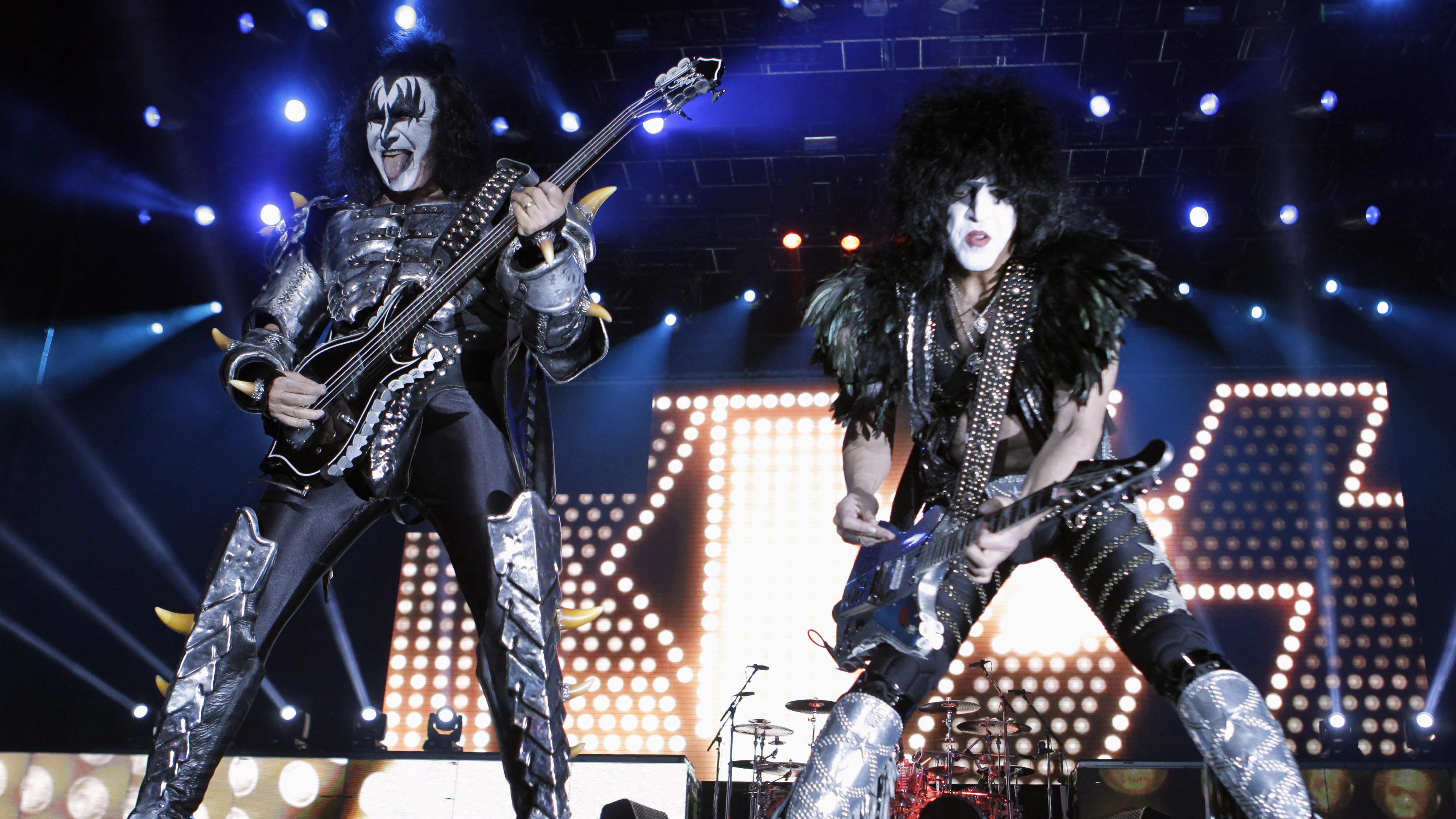 Gene Simmons (L) and Paul Stanley of rock band Kiss perform during a concert on their Latin America tour, at the Jockey Club in Asuncion November 12, 2012. REUTERS/Jorge Adorno (PARAGUAY - Tags: ENTERTAINMENT)