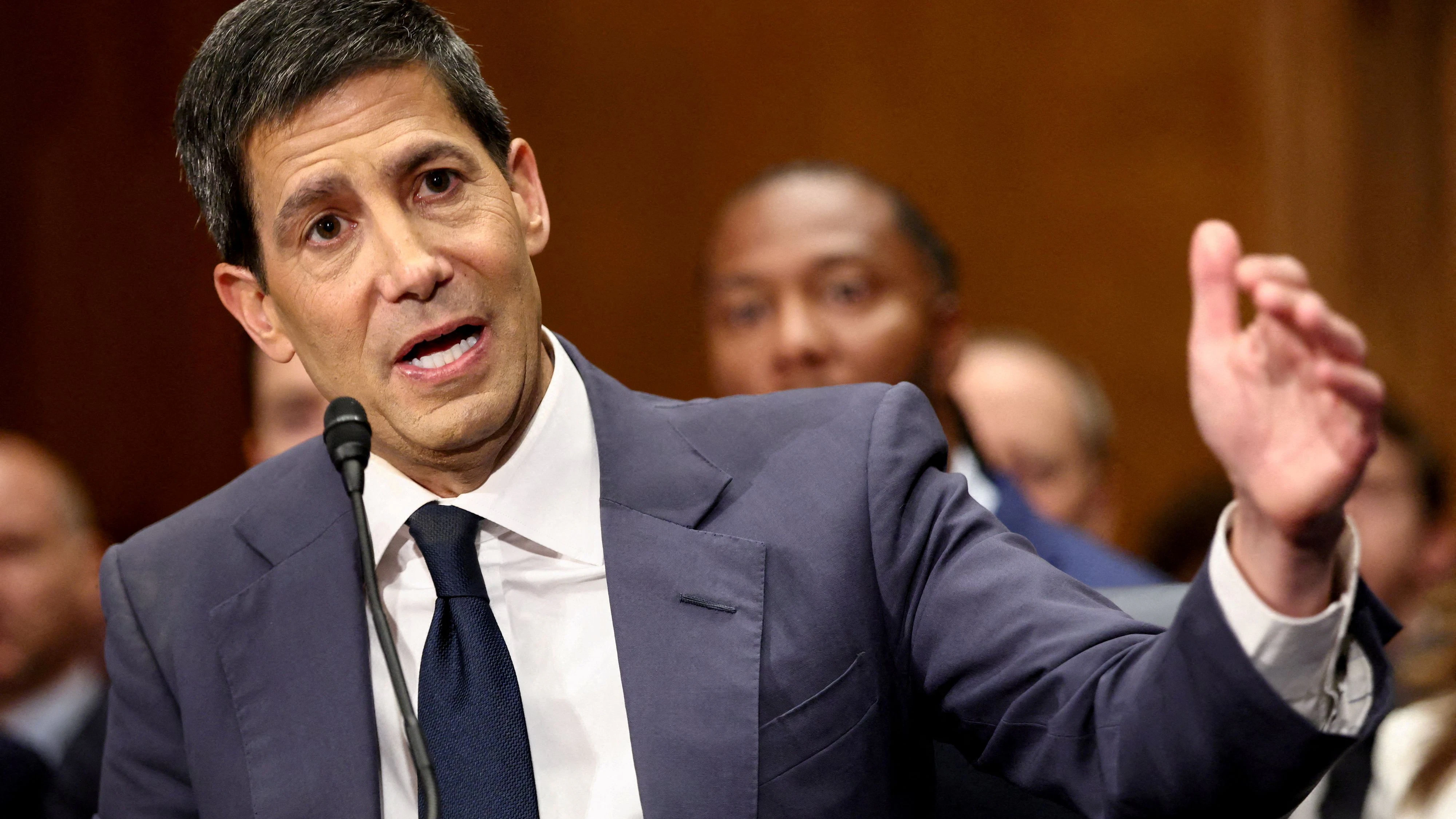 FILE PHOTO: Kevin Warsh, U.S. President Donald Trump's nominee to be next chair of the Federal Reserve, testifies before a Senate Banking Committee confirmation hearing on Capitol Hill in Washington, D.C., U.S., April 21, 2026. REUTERS/Kevin Lamarque/File Photo