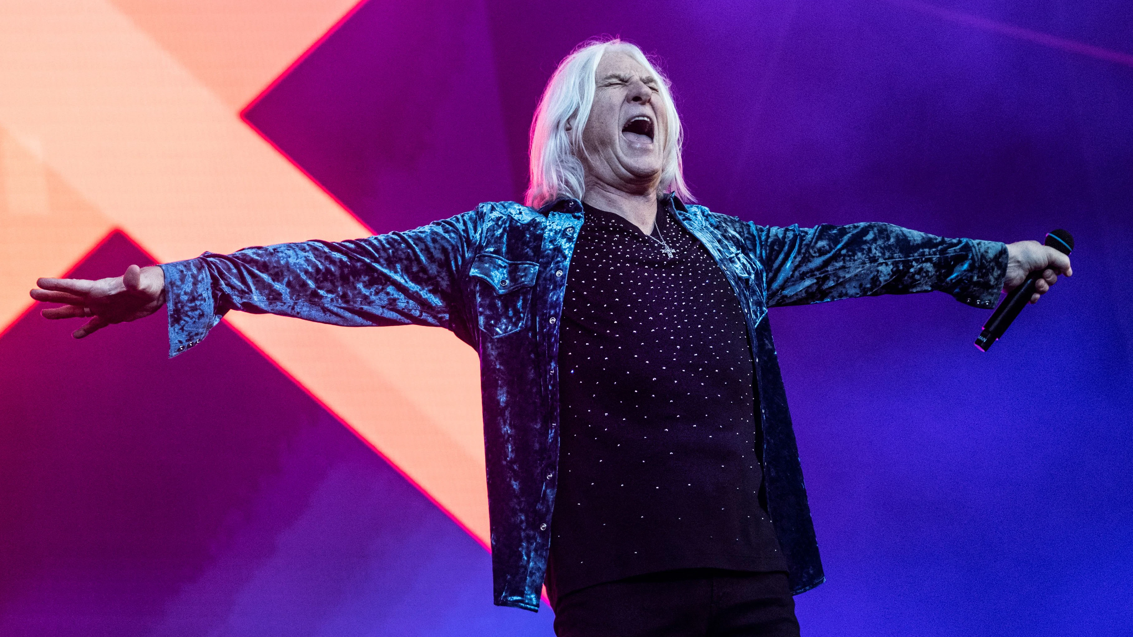 British rock band Def Leppard performs at the Rock Festival Copenhell, in Copenhagen, Denmark June 14, 2023. Ritzau Scanpix/Helle Arensbak via REUTERS ATTENTION EDITORS - THIS IMAGE WAS PROVIDED BY A THIRD PARTY. DENMARK OUT. NO COMMERCIAL OR EDITORIAL SALES IN DENMARK.