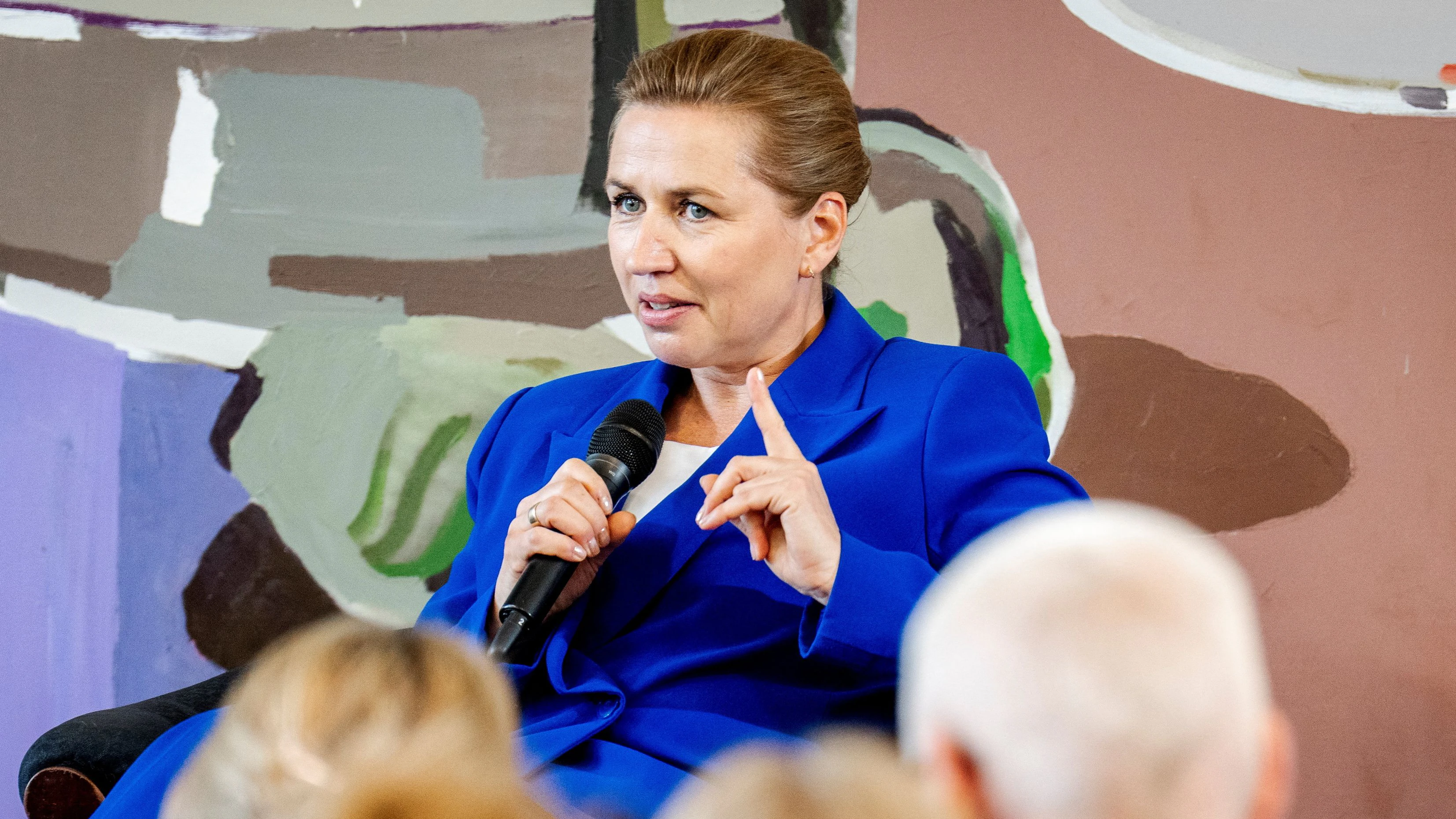 Denmark's Prime Minister Mette Frederiksen speaks at the international conference "Keeping our Children and Families Safe in the AI Era" in the Landsting Hall at Christiansborg Palace in Copenhagen, Denmark, May 12, 2026. Ritzau Scanpix/Ida Marie Odgaard /via REUTERS    ATTENTION EDITORS - THIS IMAGE WAS PROVIDED BY A THIRD PARTY. DENMARK OUT. NO COMMERCIAL OR EDITORIAL SALES IN DENMARK.