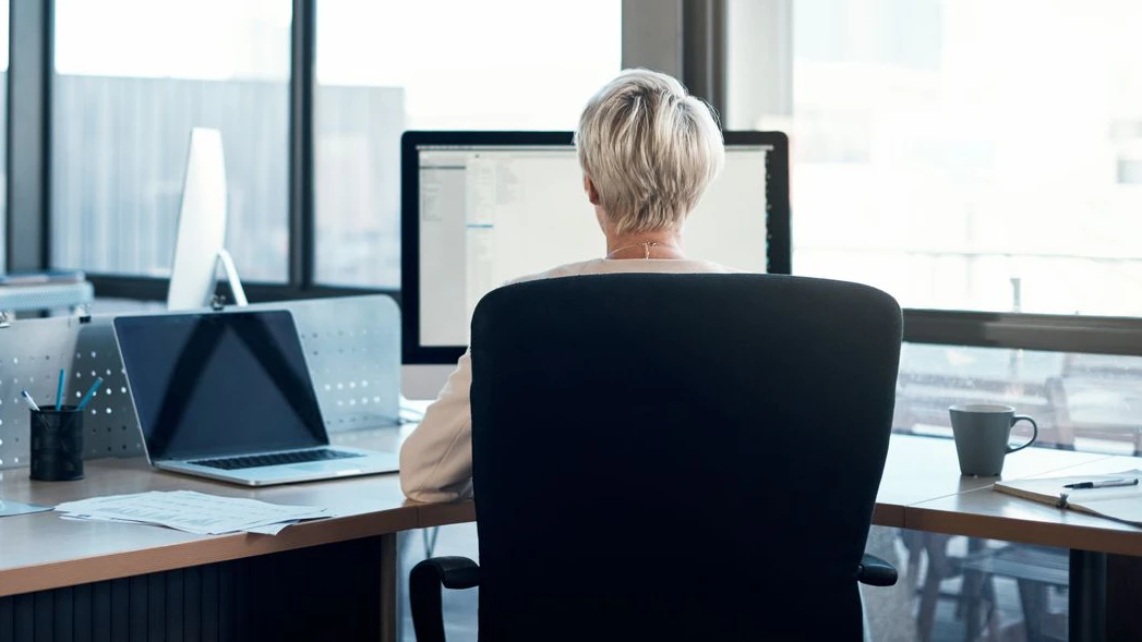 Cropped shot of a mature businesswoman working in a modern office
