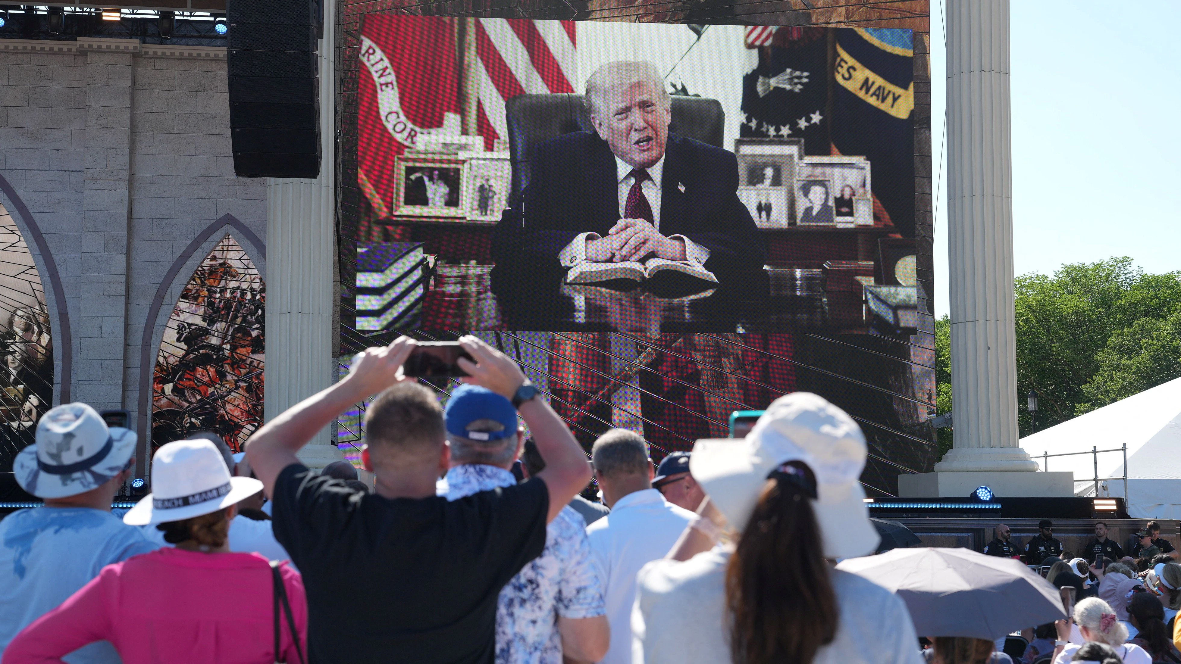 U.S. President Donald Trump speaks during a video message at the Rededicate 250: A National Jubilee of Prayer, Praise & Thanksgiving at the National Mall in Washington, D.C., U.S., May 17, 2026. REUTERS/Eric Lee   