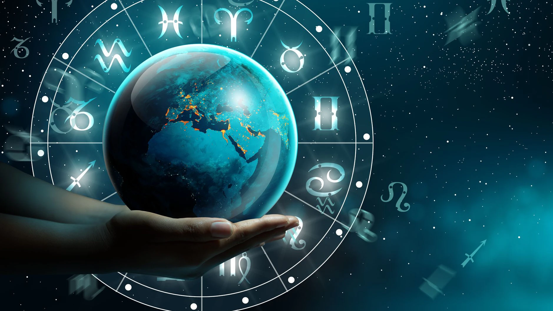 Astrological zodiac signs inside of horoscope with planet Earth in hand. Knowledge of the stars in the sky. The power of the universe concept. Elements furnished by NASA (https://visibleearth.nasa.gov/images/90008/night-light-maps-open-up-new-applications/90011l).