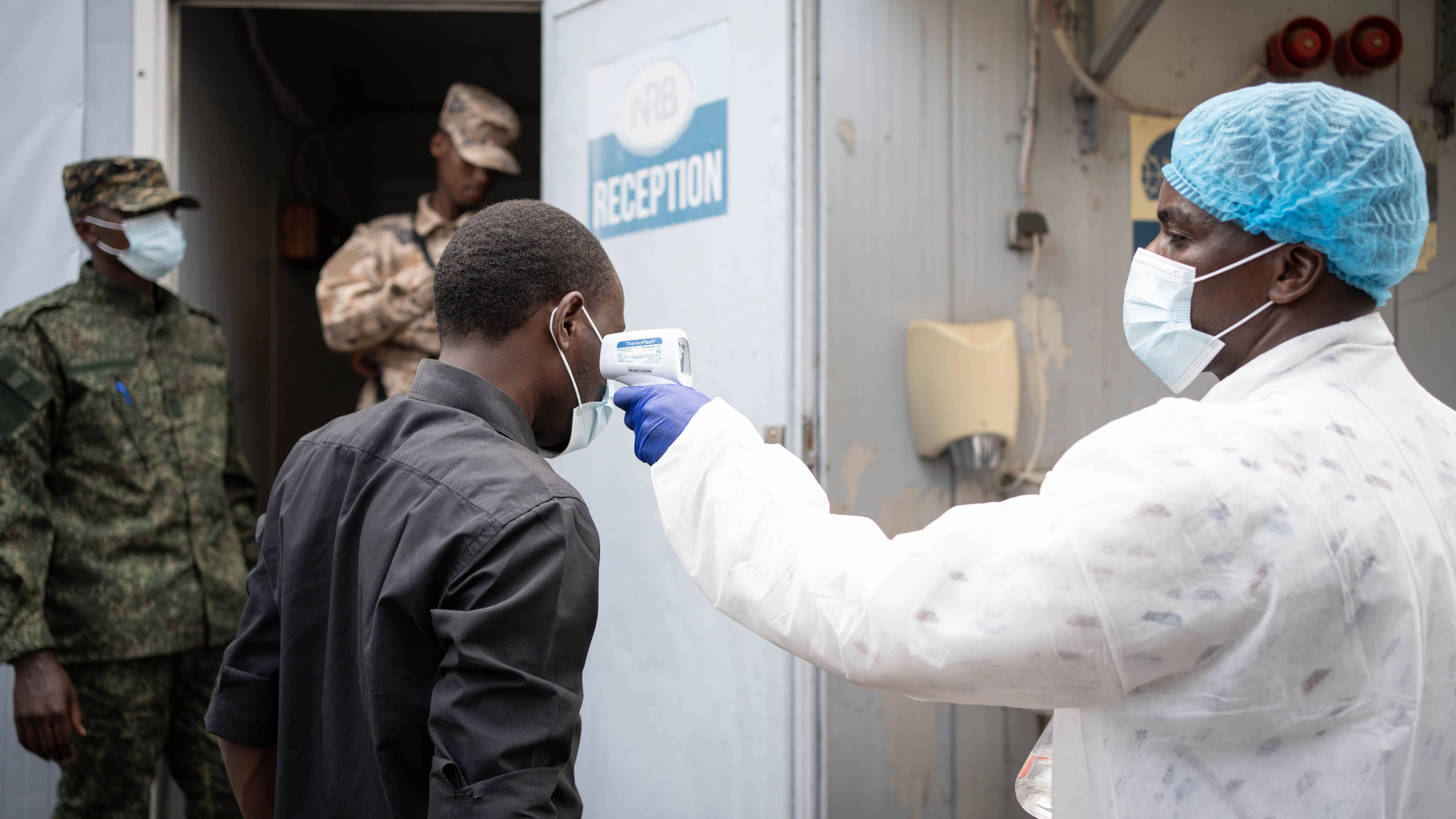 260519 -- GOMA, May 19, 2026 -- A medical worker checks the temperature of a local resident as part of Ebola screening in Goma, the Democratic Republic of the Congo DRC, on May 19, 2026. Around 131 suspected deaths and 513 suspected cases have been reported in the latest Ebola outbreak in the Democratic Republic of the Congo, DRC Health Minister Roger Kamba said Tuesday. /Xinhua DR CONGO-GOMA-EBOLA OUTBREAK Str PUBLICATIONxNOTxINxCHN