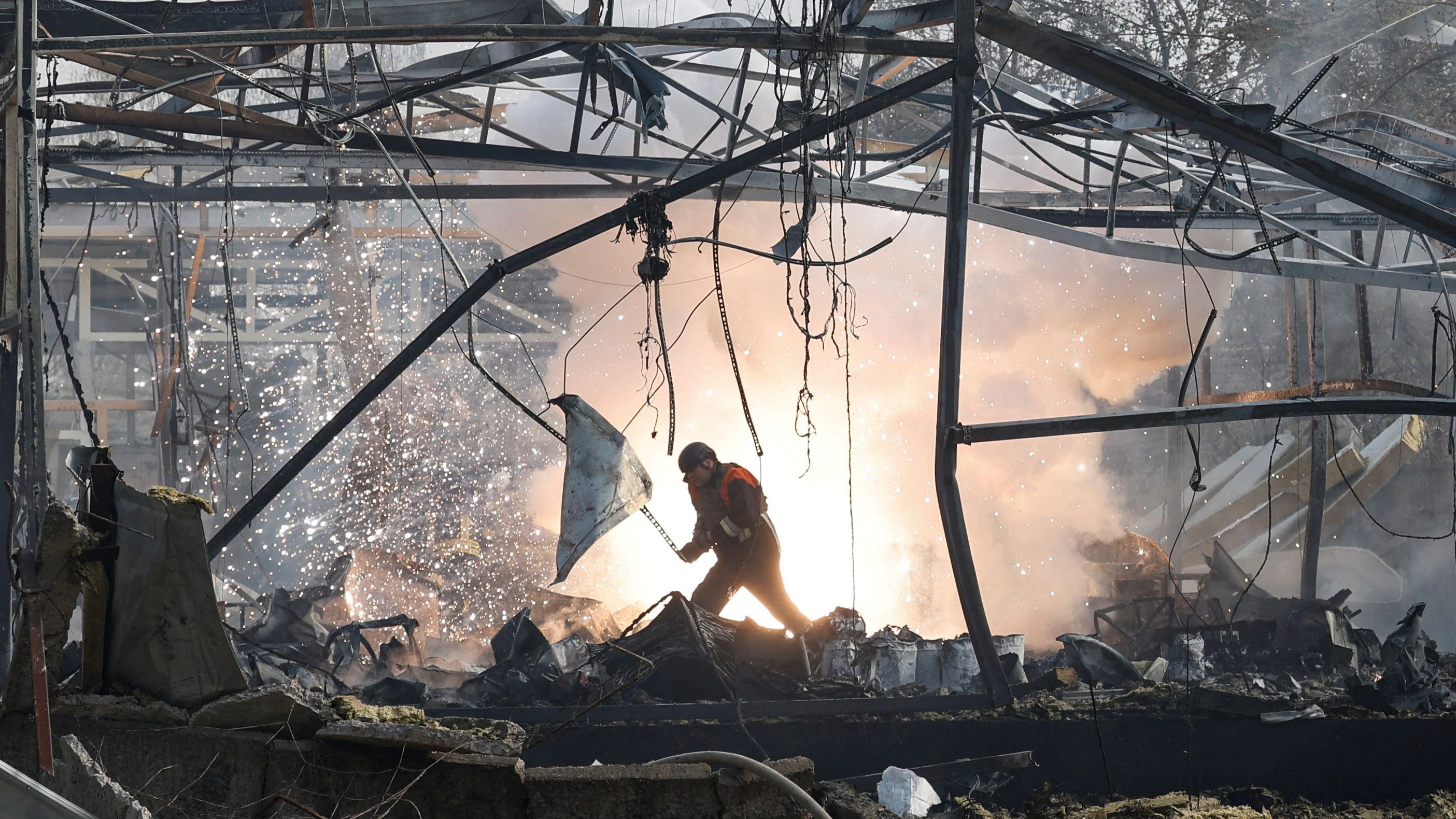 A firefighter inspects a compound of a private enterprise hit by a Russian missile strike, amid Russia's attack on Ukraine, in Chernihiv, Ukraine April 2, 2026. REUTERS/Maksym Kishka     TPX IMAGES OF THE DAY     
